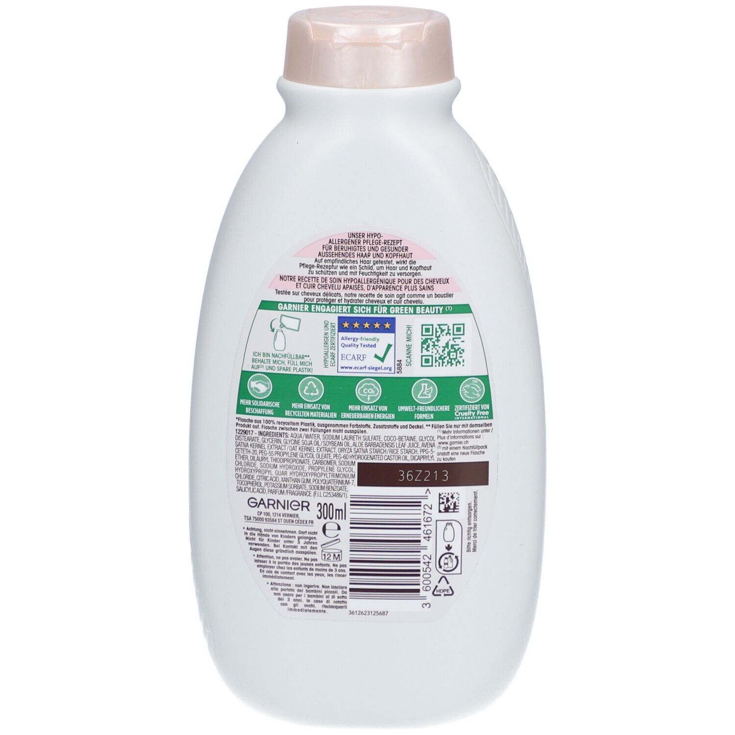 Dos du flacon blanc. Contient des informations sur les ingrédients, code QR et logos. Marque: GARNIER. Volume: 300ml.