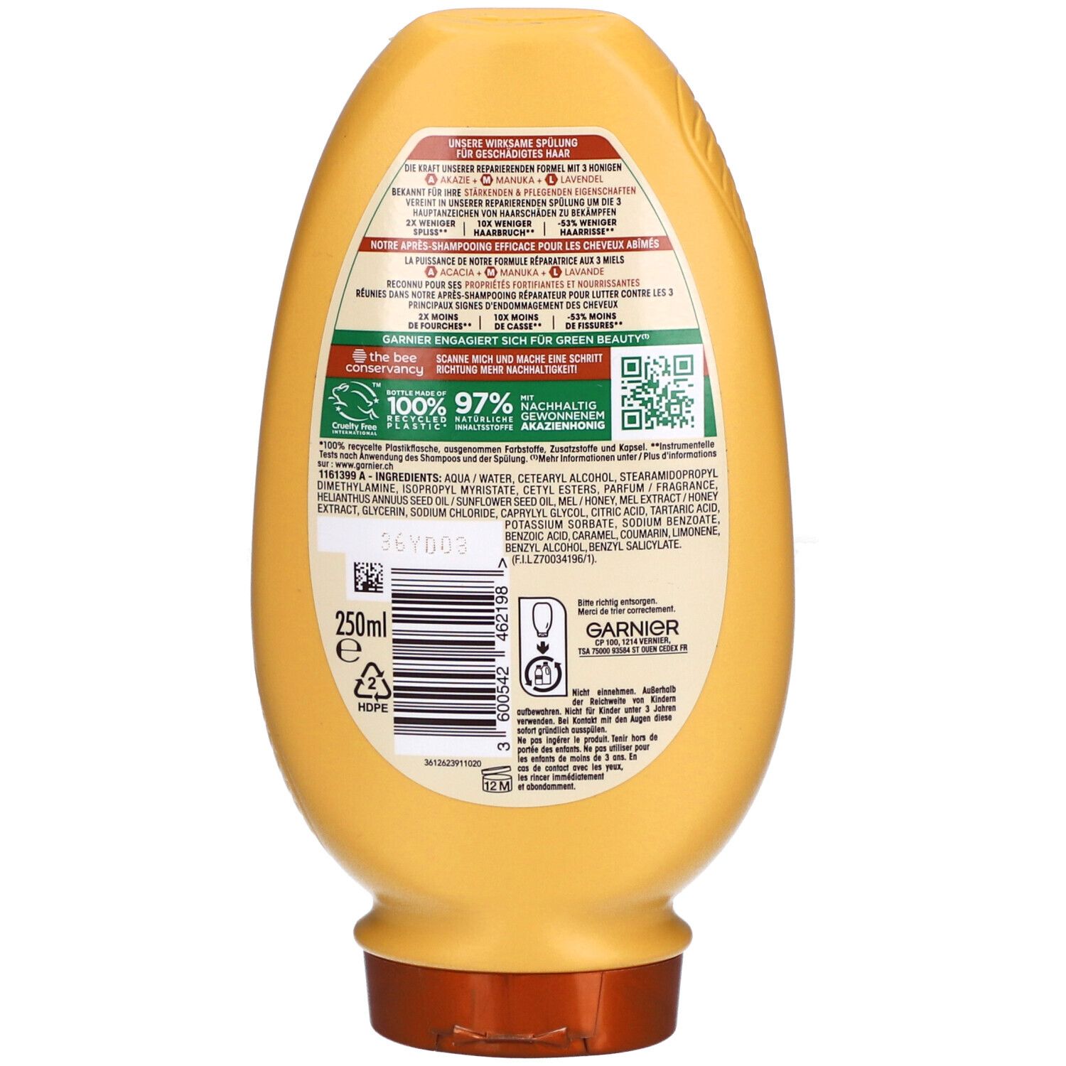 Achterkant van de gele fles. Tekst: GARNIER, ingrediënten, 250ml. Met recycling symbolen en QR-code.