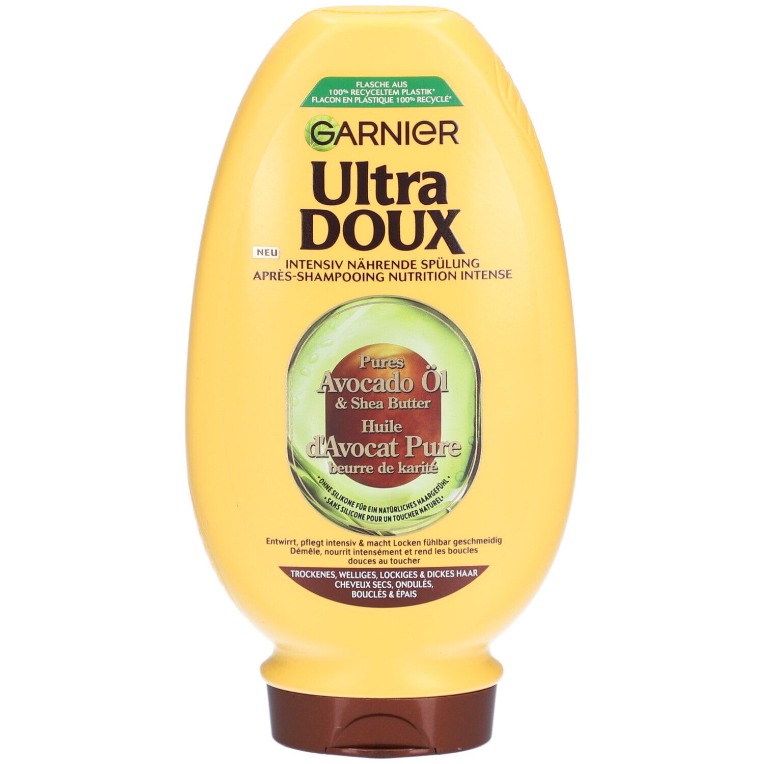 Gele fles Garnier Ultra Doux. Avocado-olie & shea butter. Opschrift: Intensief voedende conditioner. Voor droog, krullend haar.