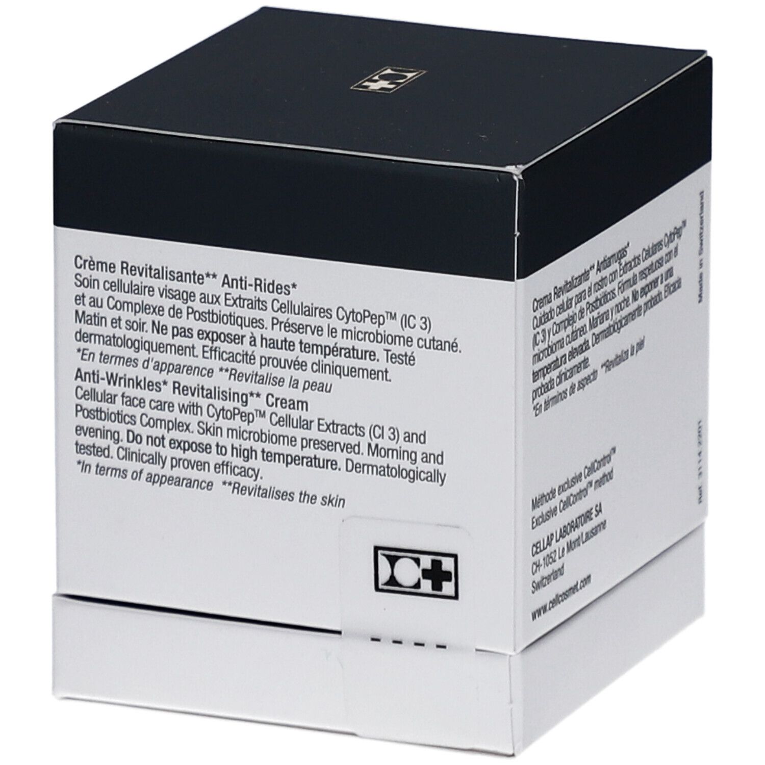 Boîte cosmétique blanche et noire. Texte en français et anglais. Inscription: Crème Revitalisante Anti-Rides, Anti-Wrinkles Revitalising Cream.