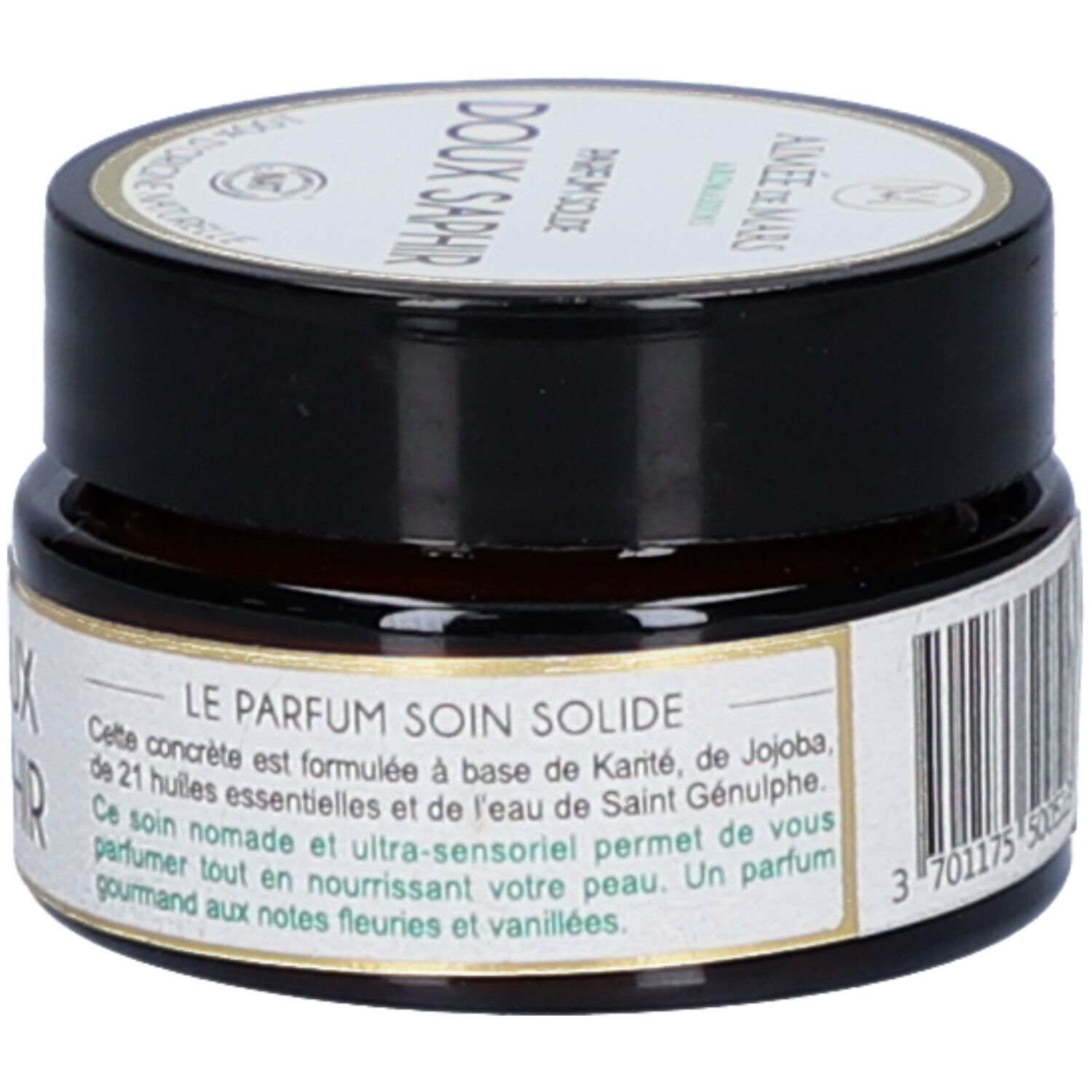 Klein, rond potje met zwarte deksel. Opschrift: Doux Saphir. Productbeschrijving en ingrediënten. Vegan-zegel.