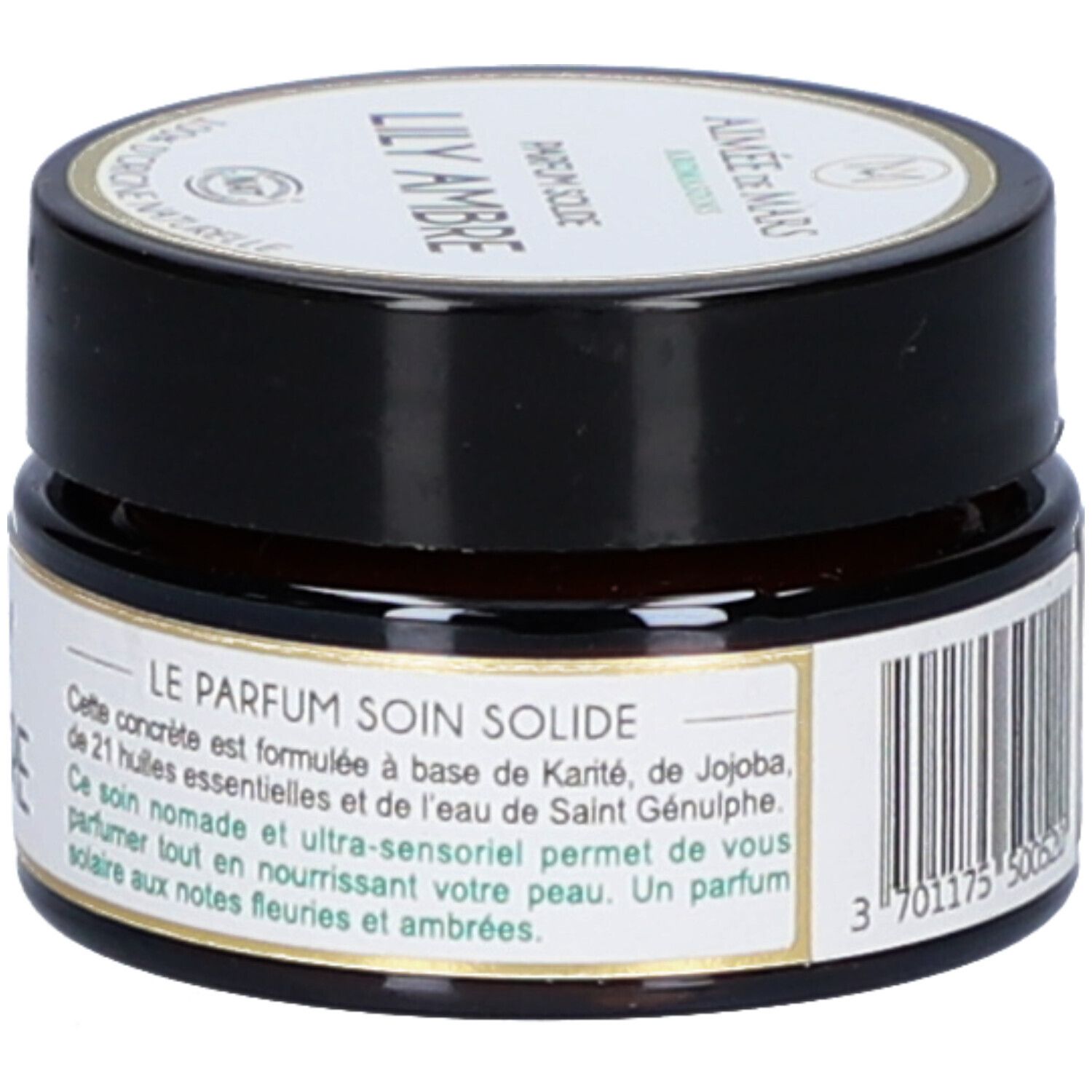Bruine pot met zwarte deksel. Etiket met productinformatie. Opschrift: Lily Ambre Parfum Solide. 21 essentiële oliën.