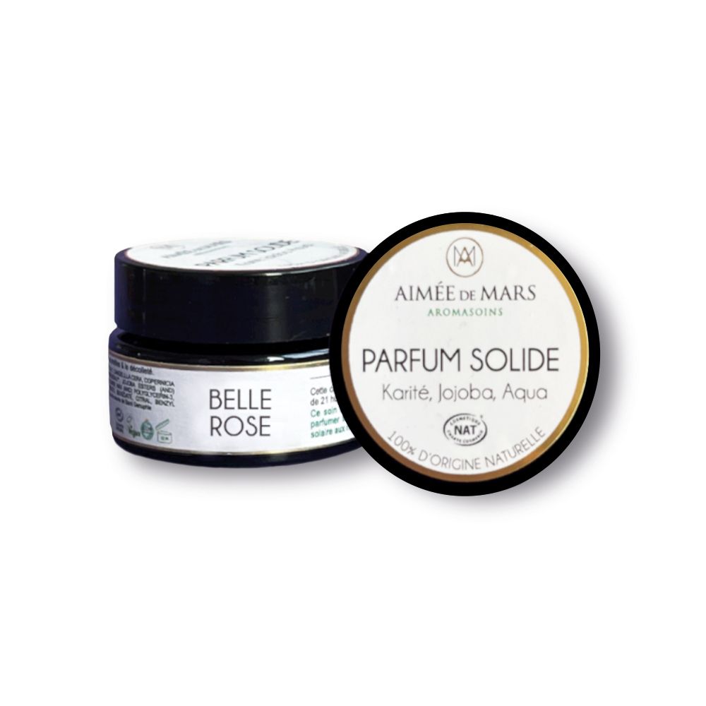 Klein potje met zwarte deksel. Op deksel "Belle Rose". Daarnaast een open potje met "Parfum Solide".