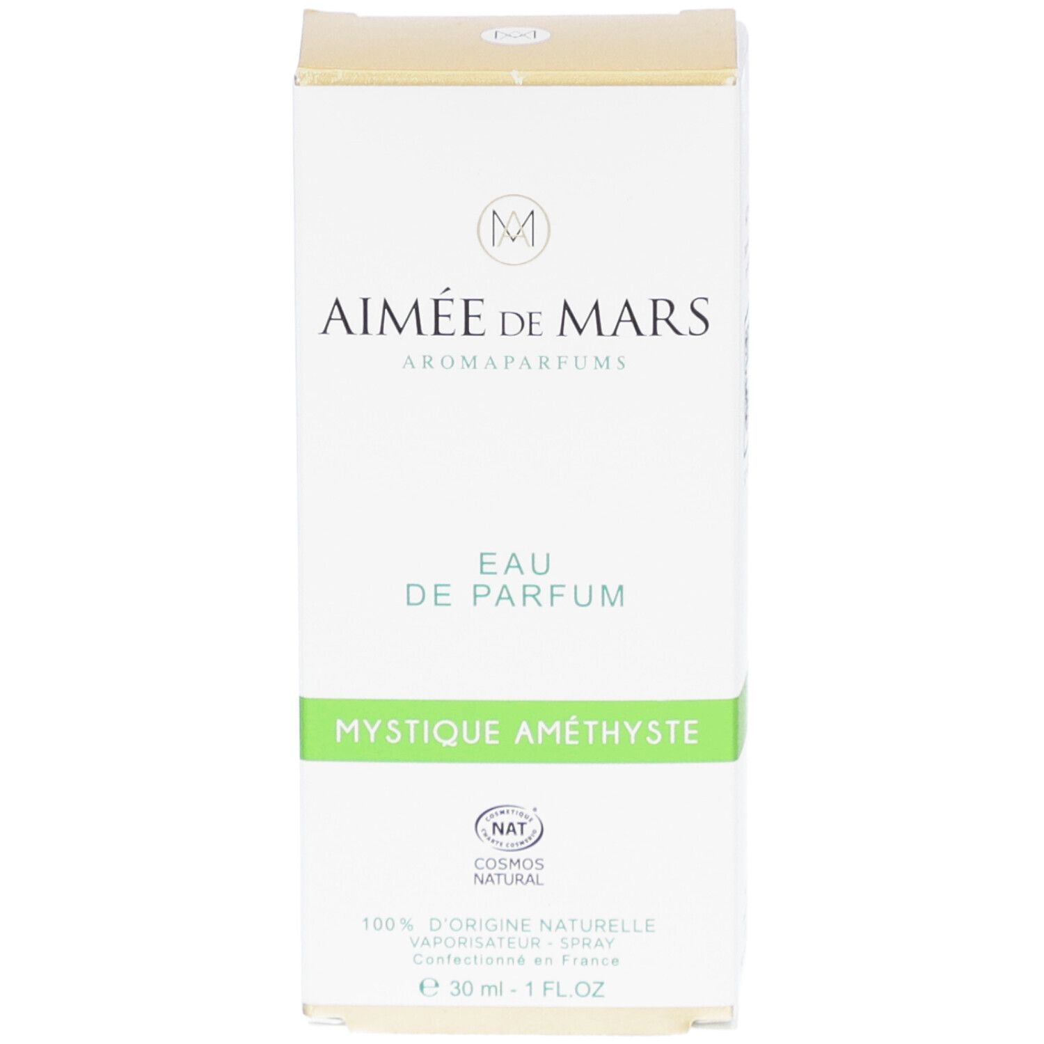 Witte doos met productnaam en logo. "Mystique Améthyste" en "Eau de Parfum" zichtbaar. Certificering.