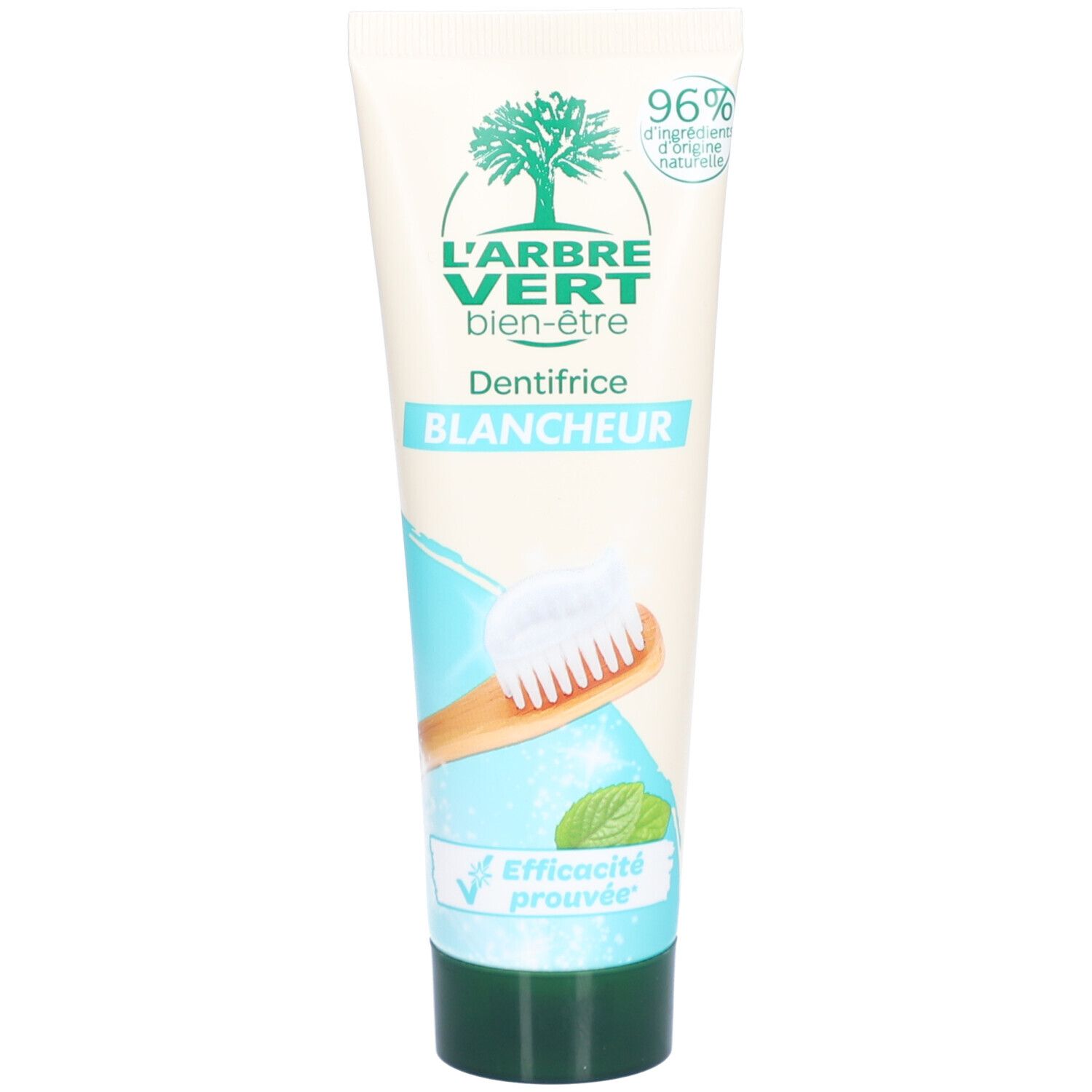 Tube de dentifrice L'ARBRE VERT, blanc, bouchon vert. Inscription: Dentifrice Blancheur, logo, 96% ingrédients d'origine naturelle.