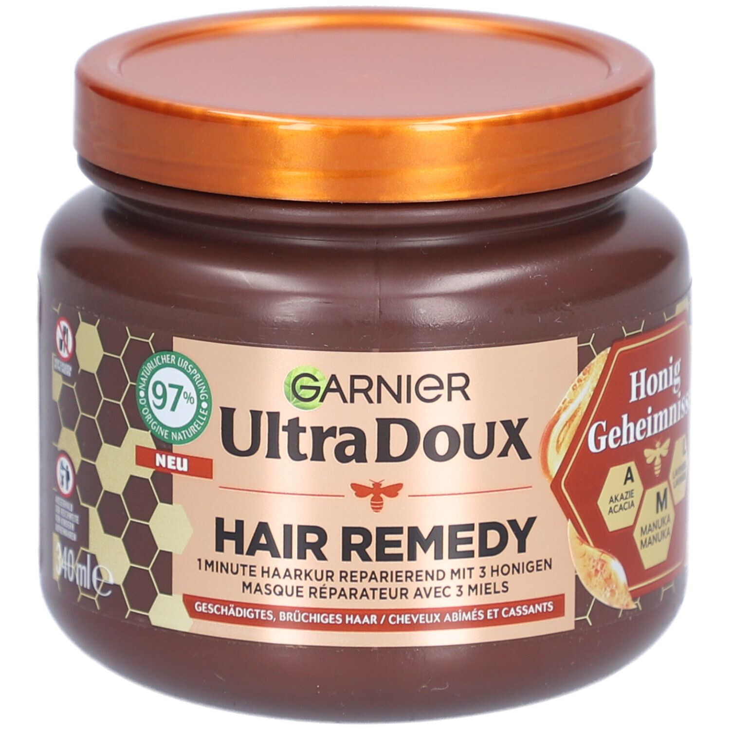 Garnier Ultra Doux Hair Remedy Masque réparateur aux 3 miels, 340ml. Face avant avec motif miel.