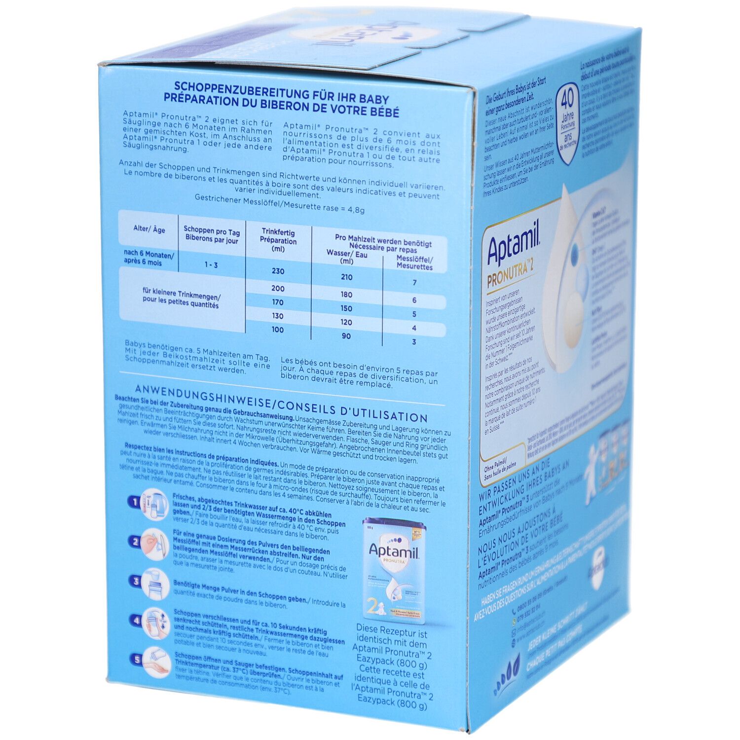 Boîte de lait maternisé Aptamil Pronutra 2 avec instructions de préparation et tableau nutritionnel.