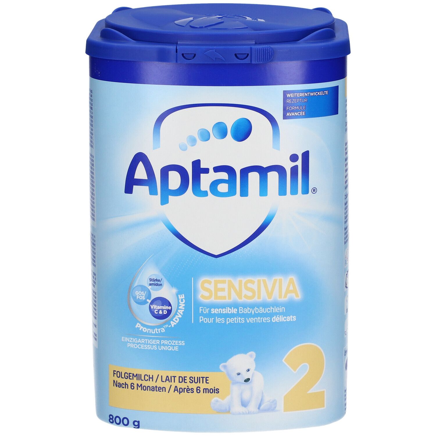 Boîte de lait en poudre Aptamil Sensivia 2. Design bleu et blanc avec nom du produit, ingrédients et dosage. 800g.