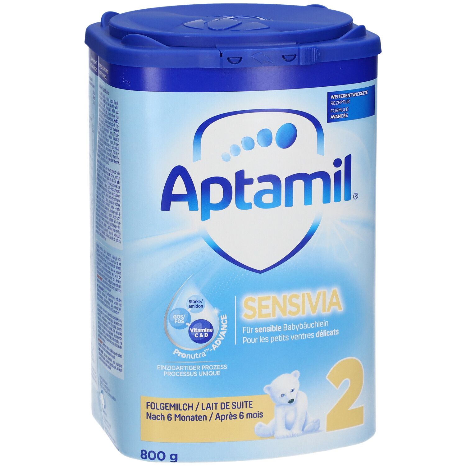 Boîte de lait en poudre Aptamil Sensivia 2. Design bleu et blanc avec nom du produit, ingrédients et dosage. 800g.