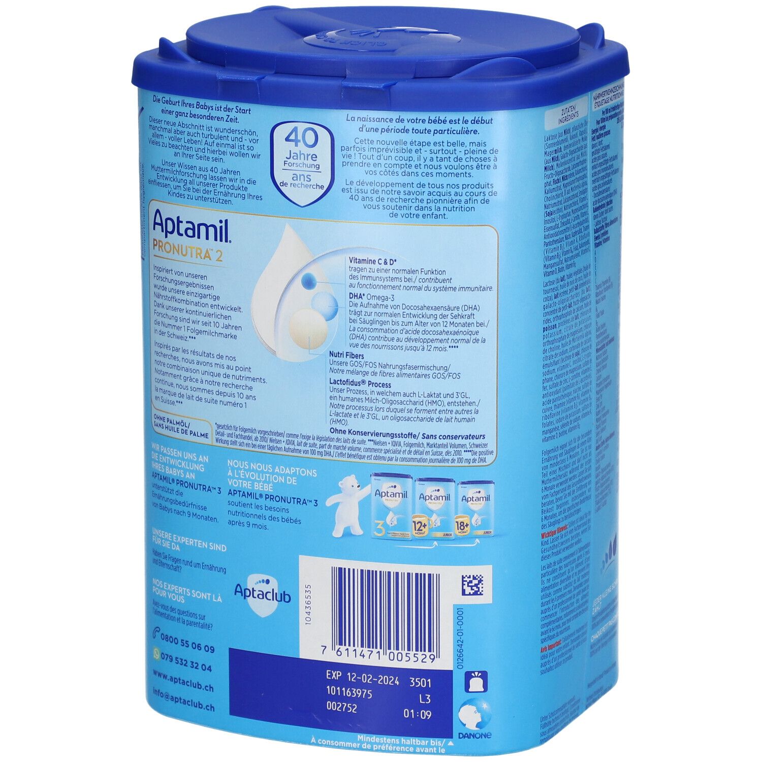 Dos de la boîte Aptamil Pronutra 2. Texte sur le développement du bébé. Boîte bleue avec couvercle. 800g. Texte en allemand.