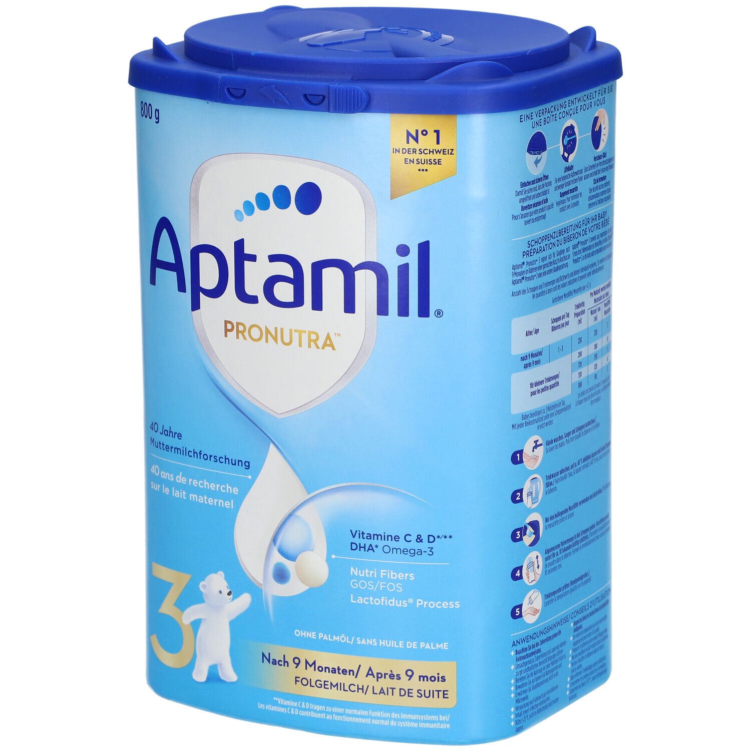 Boîte de lait de suite Aptamil Pronutra 3. Bleu et blanc, avec couvercle. Contient Vitamine C & D, DHA Oméga-3, Nutri Fibers. 800g.