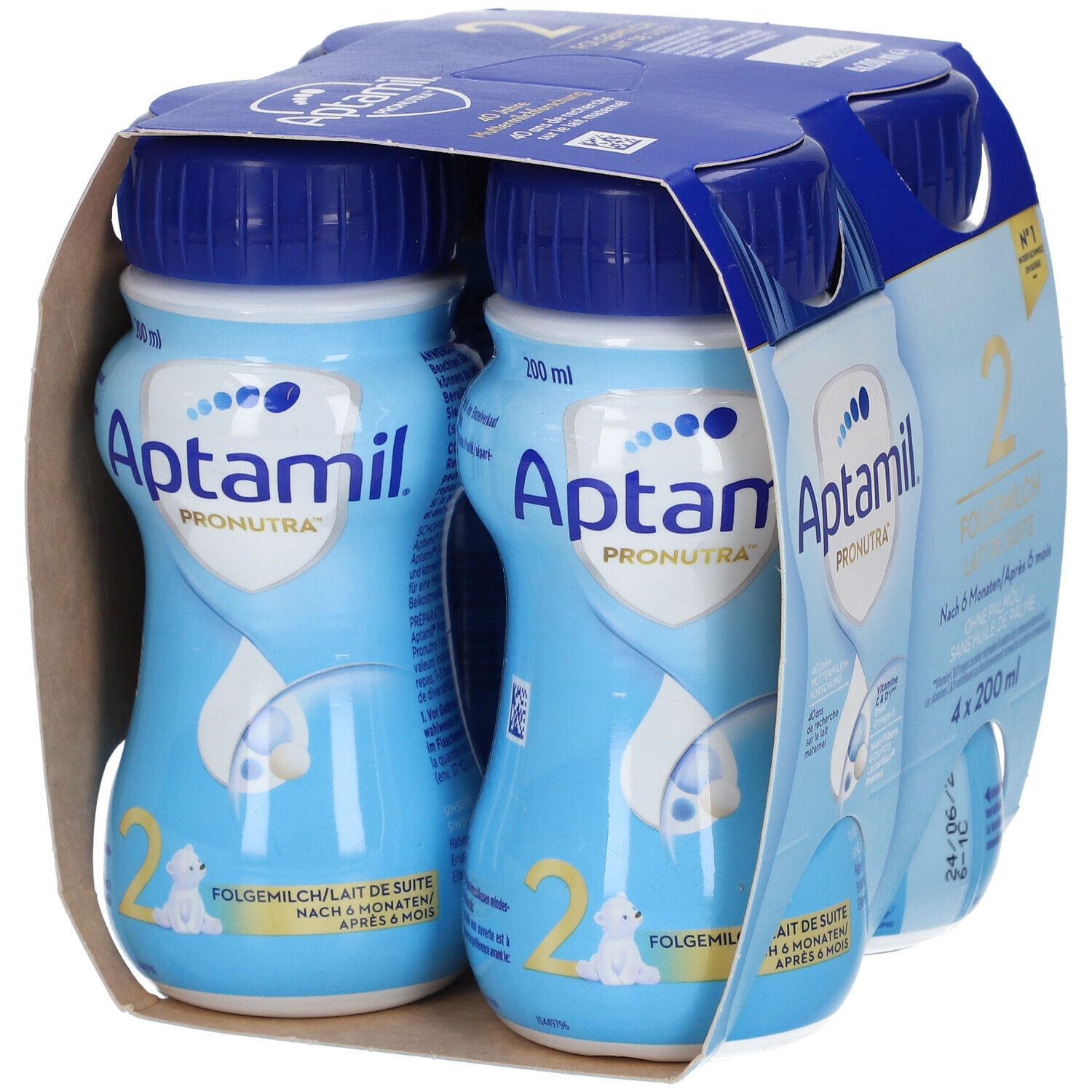 Emballage de deux bouteilles Aptamil 2 Lait de suite. Bouteilles bleues avec bouchons bleus, dans un emballage en carton. Inscriptions : Aptamil, 2, Lait de suite.
