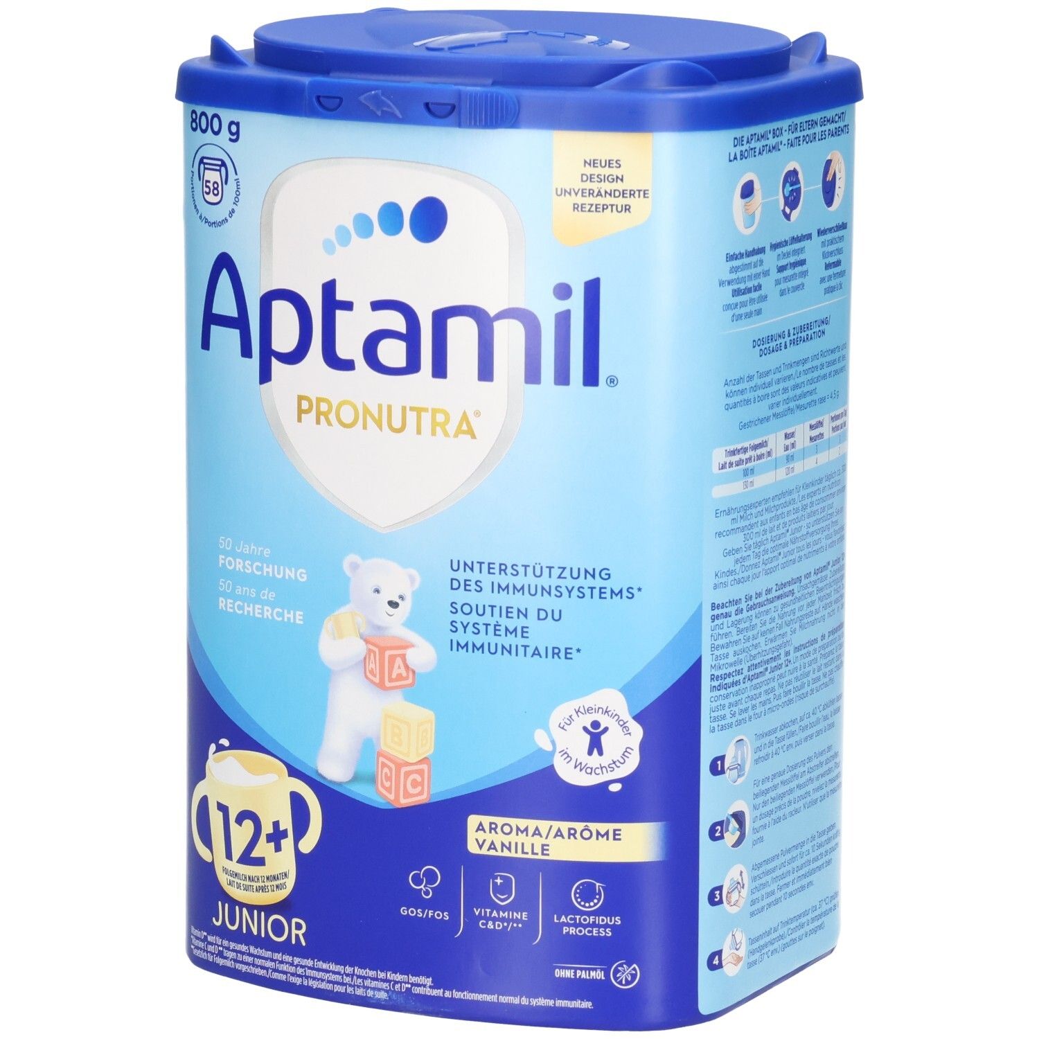 Aptamil Pronutra Junior 12+ Vanille. Boîte bleue avec couvercle. Contient 800g. Inscriptions: Vitamine C, Vitamine D, Nutri Fibers, Lactofidus Process.