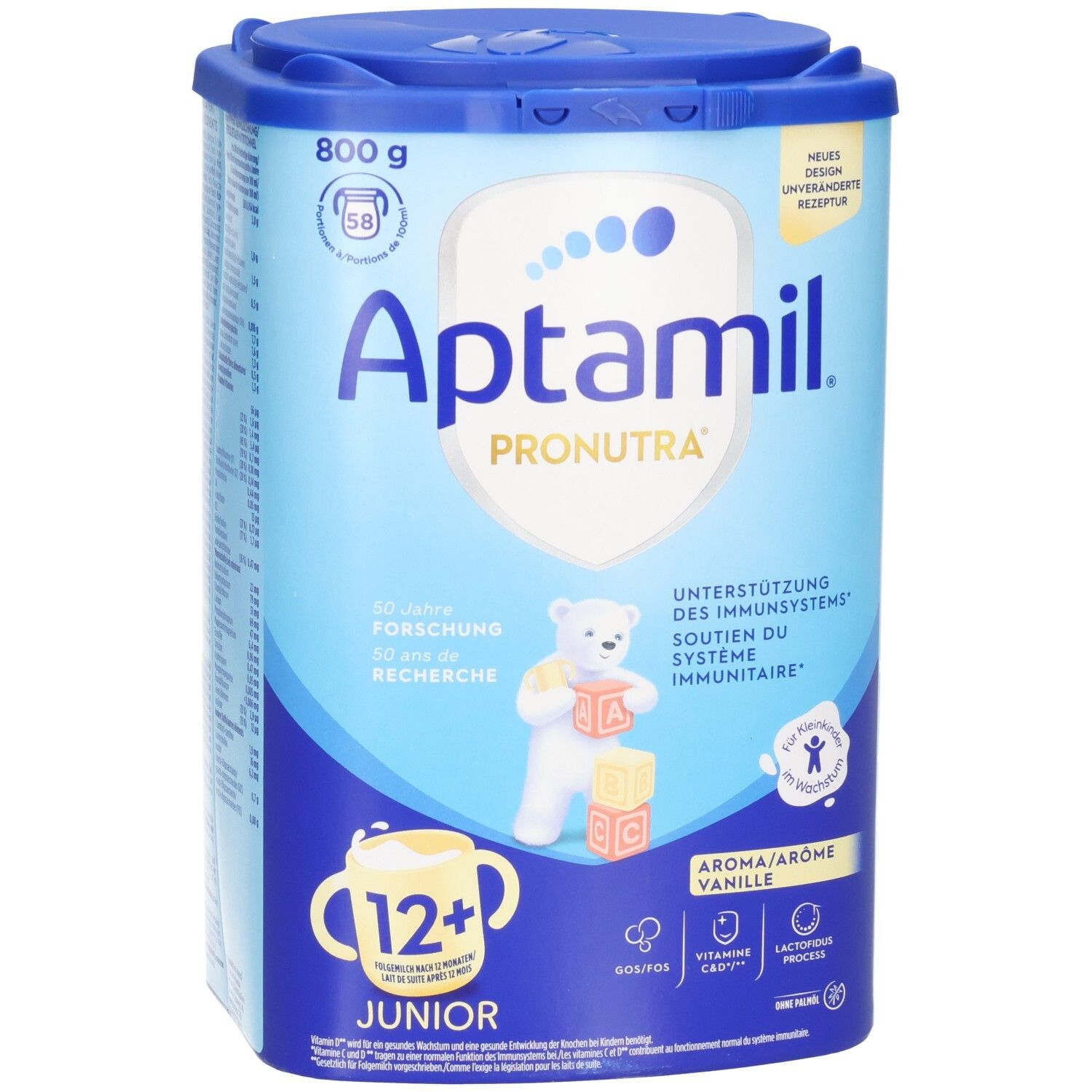 Aptamil Pronutra Junior 12+ Vanille. Boîte bleue avec couvercle. Contient 800g. Inscriptions: Vitamine C, Vitamine D, Nutri Fibers, Lactofidus Process.