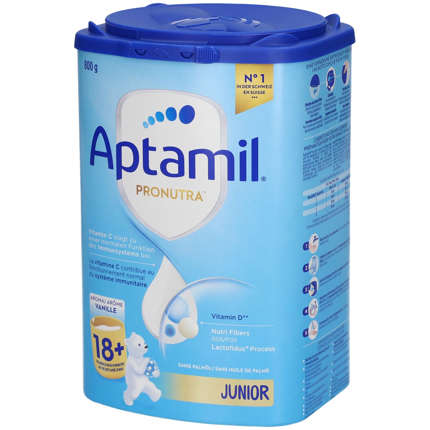 Boîte bleu clair avec couvercle. Aptamil Pronutra, 18+ Vanille, Junior. Contient Vitamine C et D. 800g. Illustration ours.
