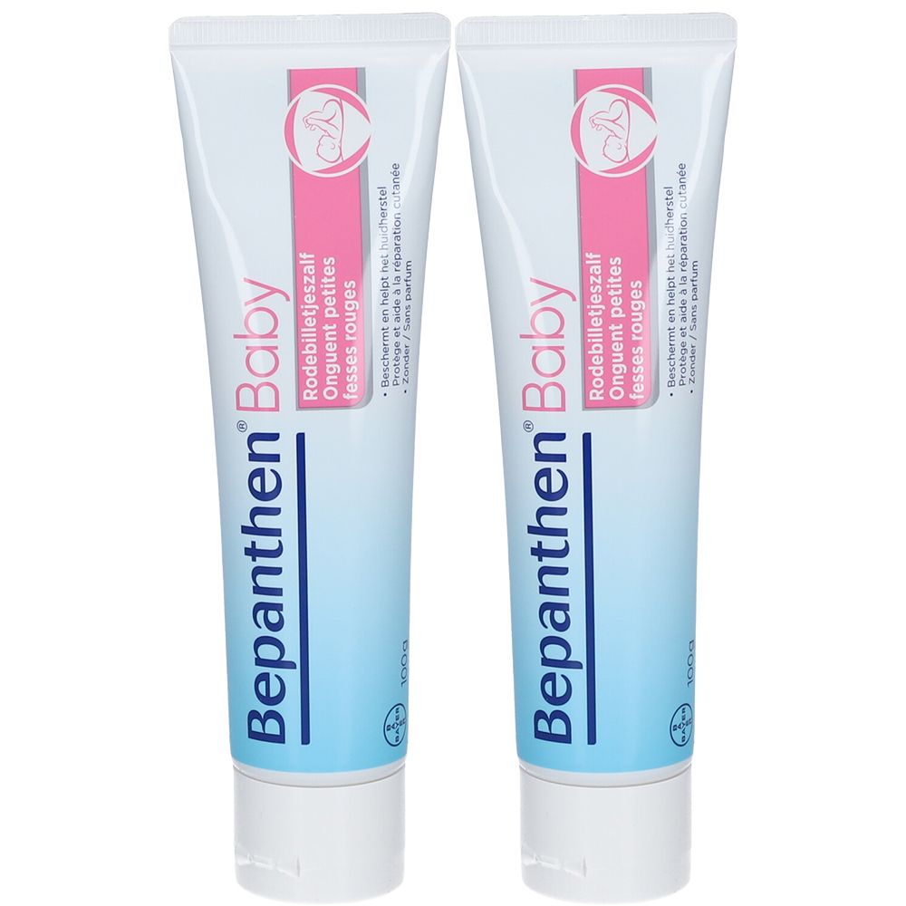 Twee tubes Bepanthen Baby crème. Witte tubes met roze en lichtblauwe accenten. Opschrift: Rodebilletjeszalf, Onguent petites fesses rouges.