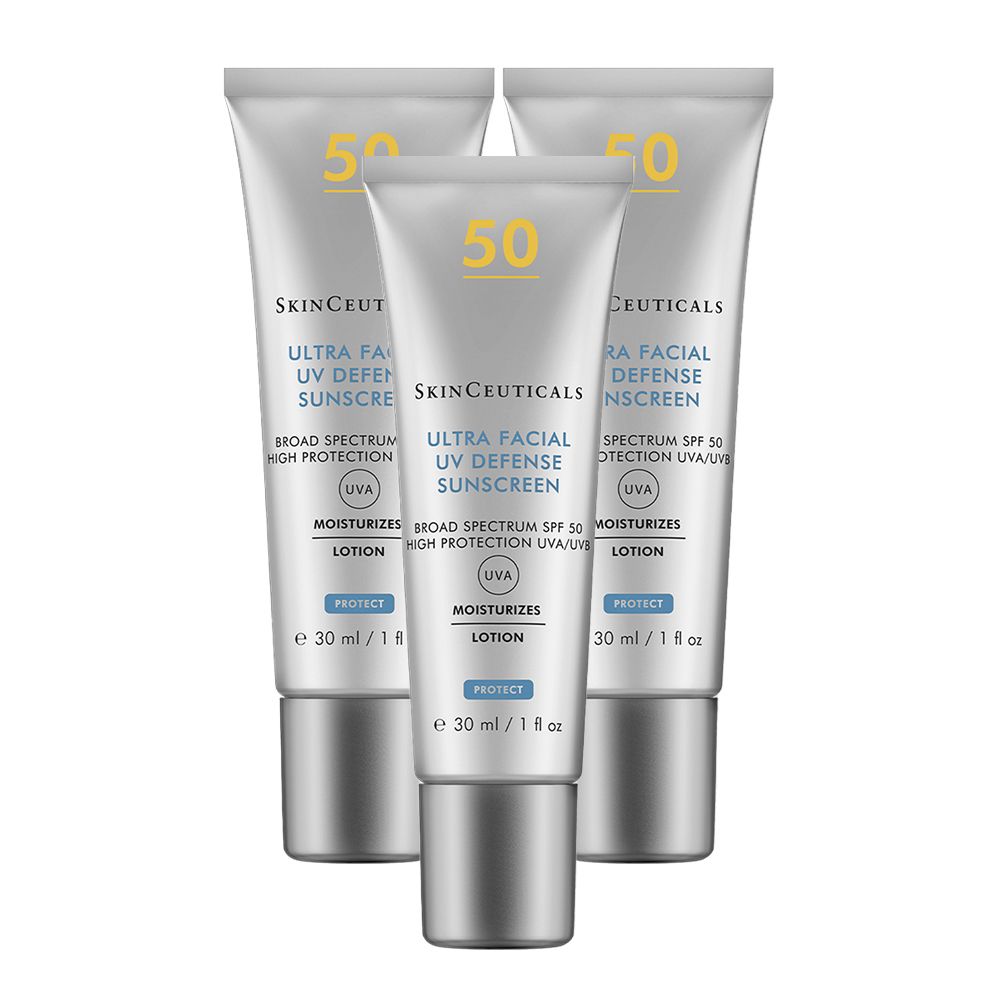 Trois tubes de SkinCeuticals Ultra Facial UV Defense SPF 50. Tubes gris avec bouchons argentés. Inscription : écran solaire, SPF 50.