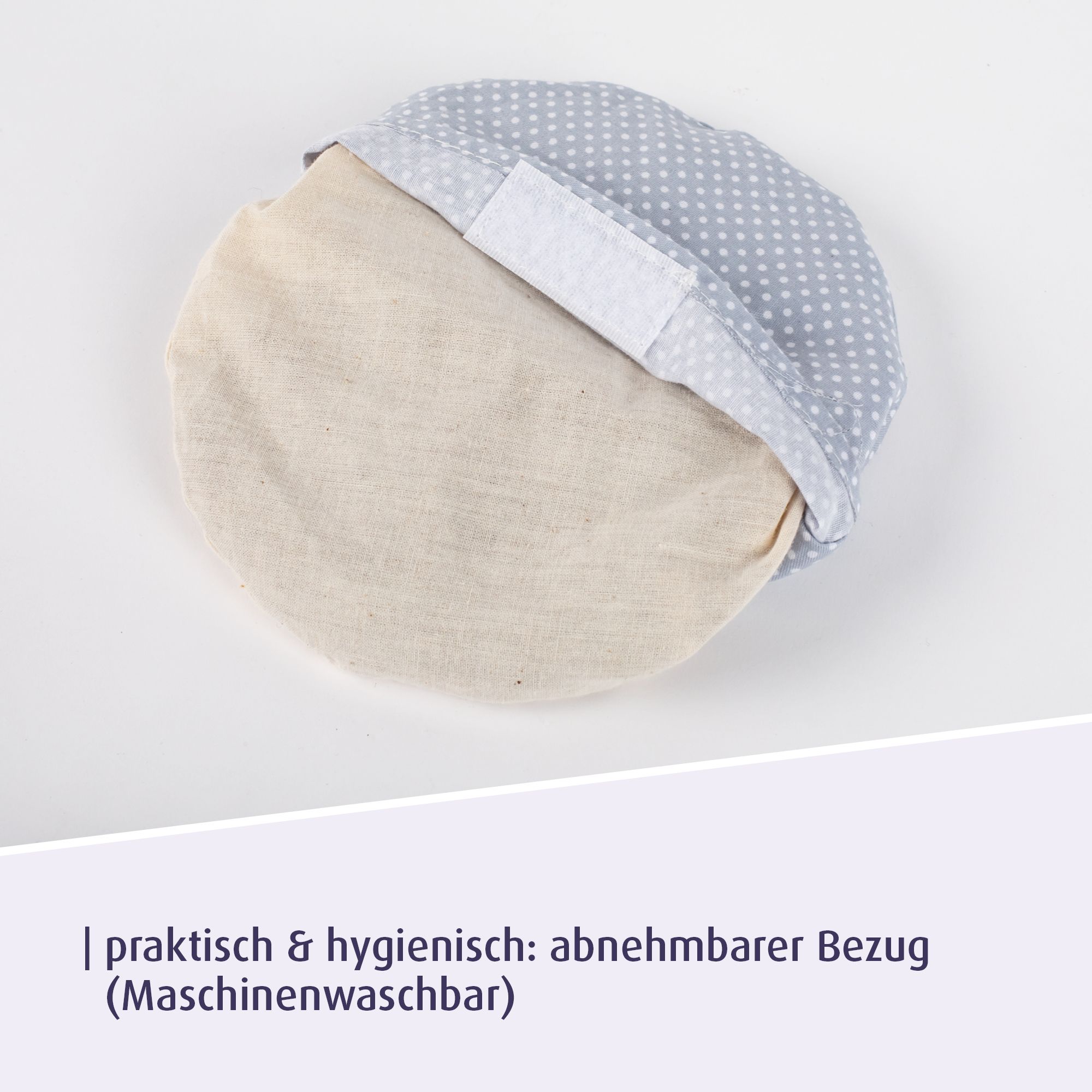 Coussin à pois avec housse amovible. Texte : Pratique et hygiénique : housse amovible (lavable en machine).