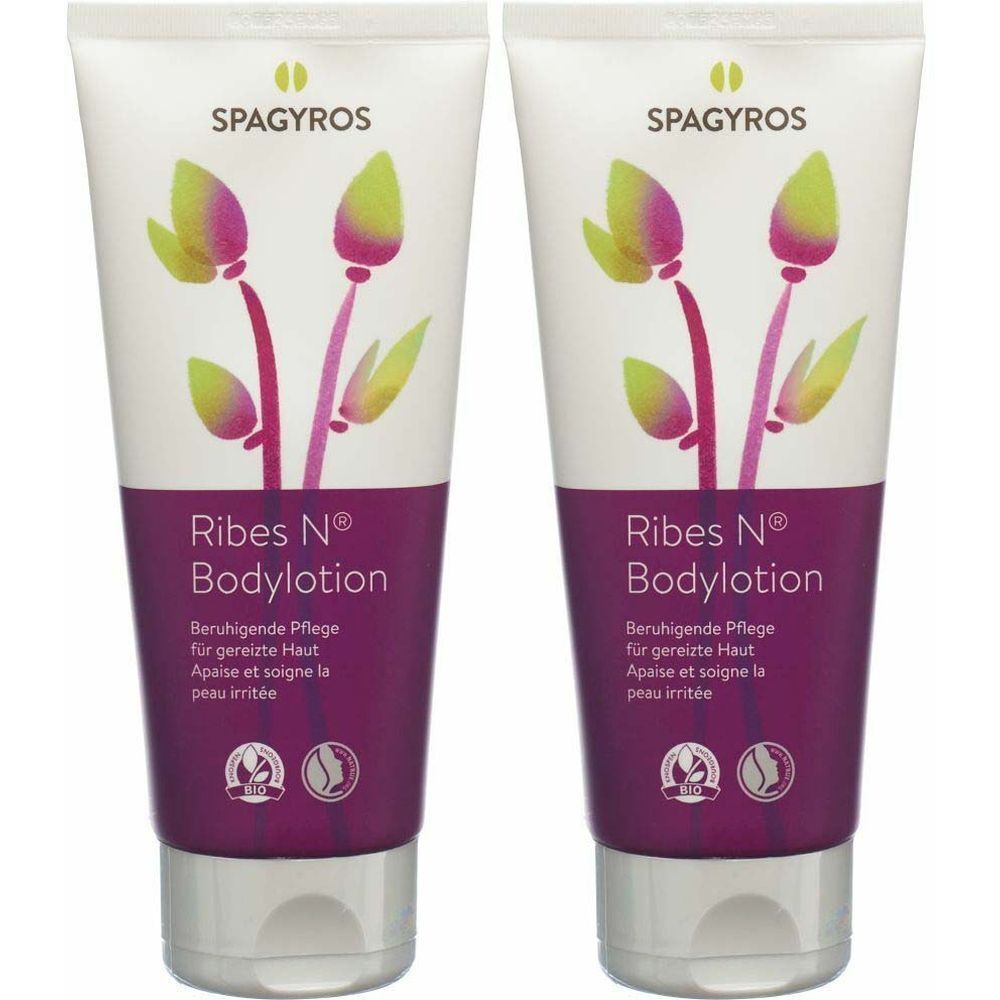 Deux tubes de SPAGYROS Ribes N® Bodylotion. Tubes blancs avec motifs floraux violets et verts. Texte: Apaise et soigne la peau irritée.