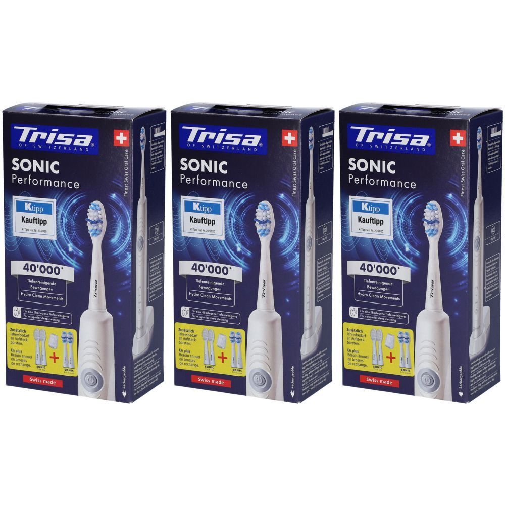 Trois boîtes de brosses à dents TRISA Sonic Performance. Chaque boîte présente la brosse à dents et des têtes de rechange.