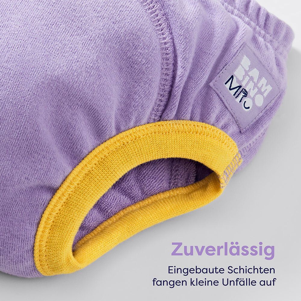 Paarse oefenbroek met gele randen. Tekst: Betrouwbaar. Ingebouwde lagen vangen kleine ongelukjes op.