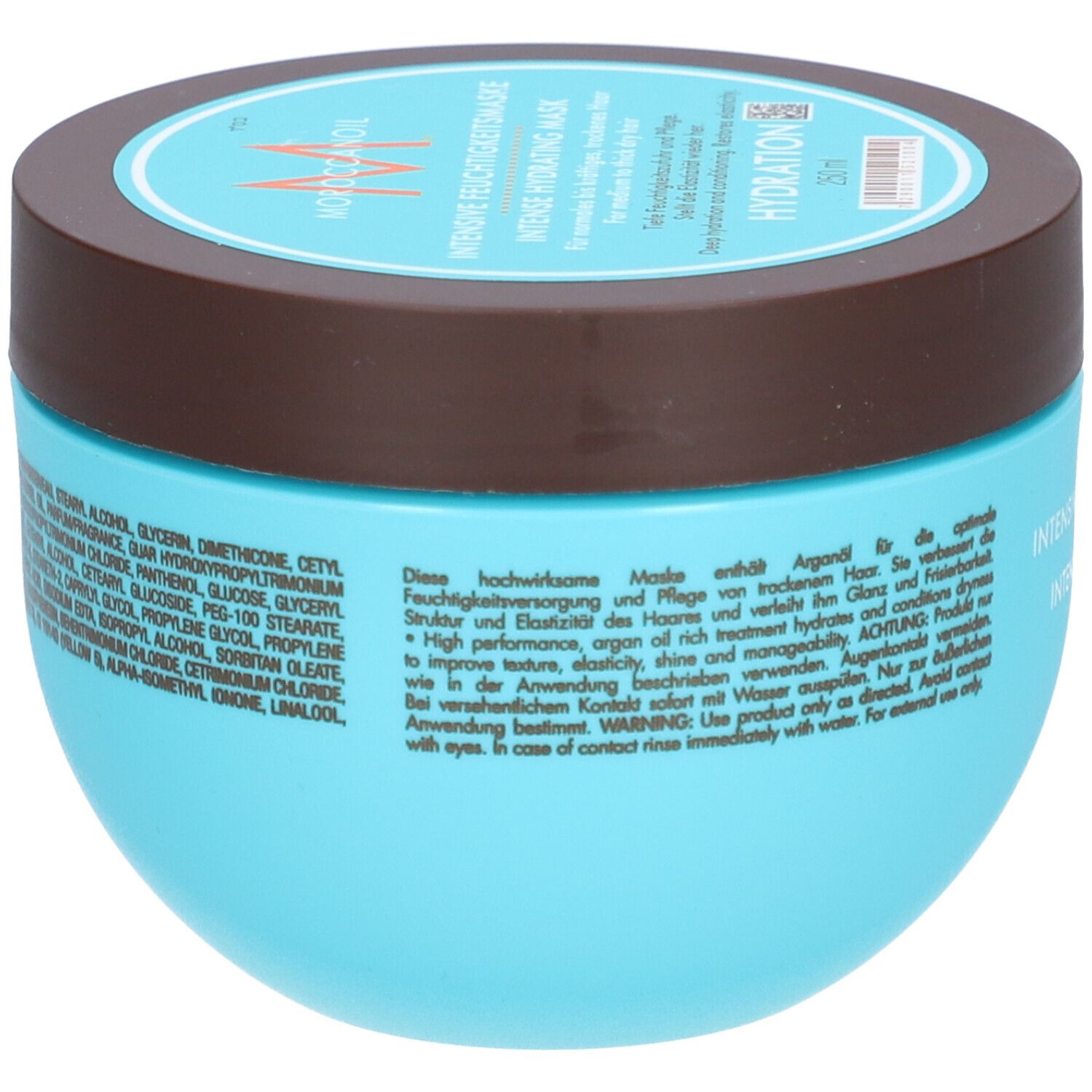 Pot bleu clair avec couvercle marron, contient un masque capillaire. Étiquetage en allemand et anglais.