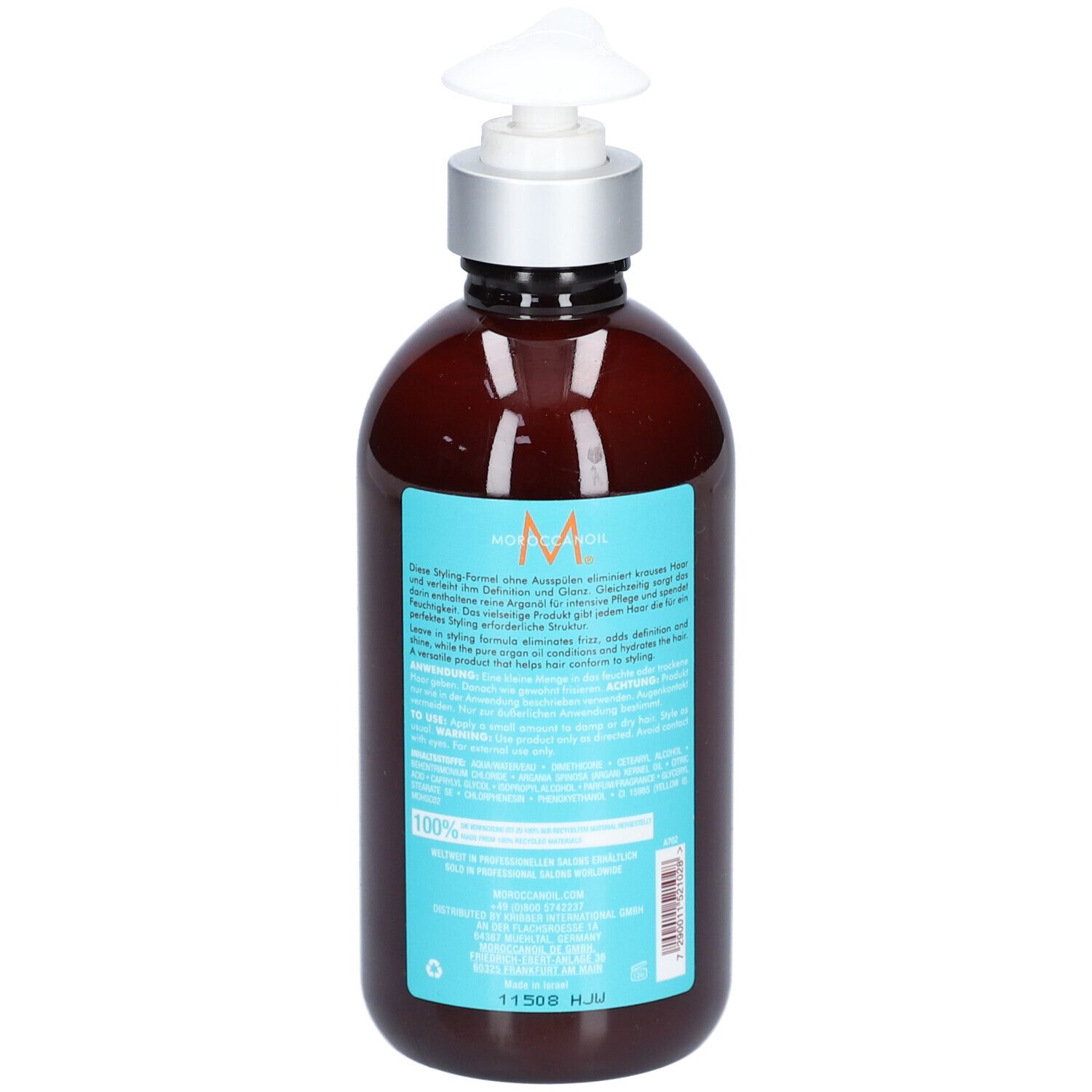 Bouteille brune avec distributeur argenté et étiquette turquoise avec le logo Moroccanoil.