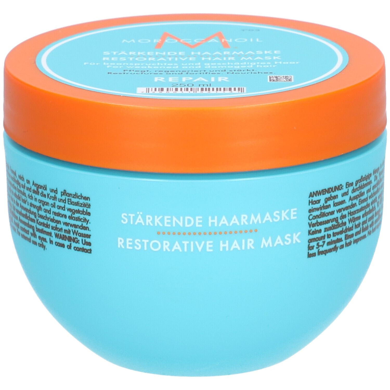 Pot bleu turquoise avec couvercle orange. Inscription : Masque capillaire réparateur. Marque : Moroccanoil.
