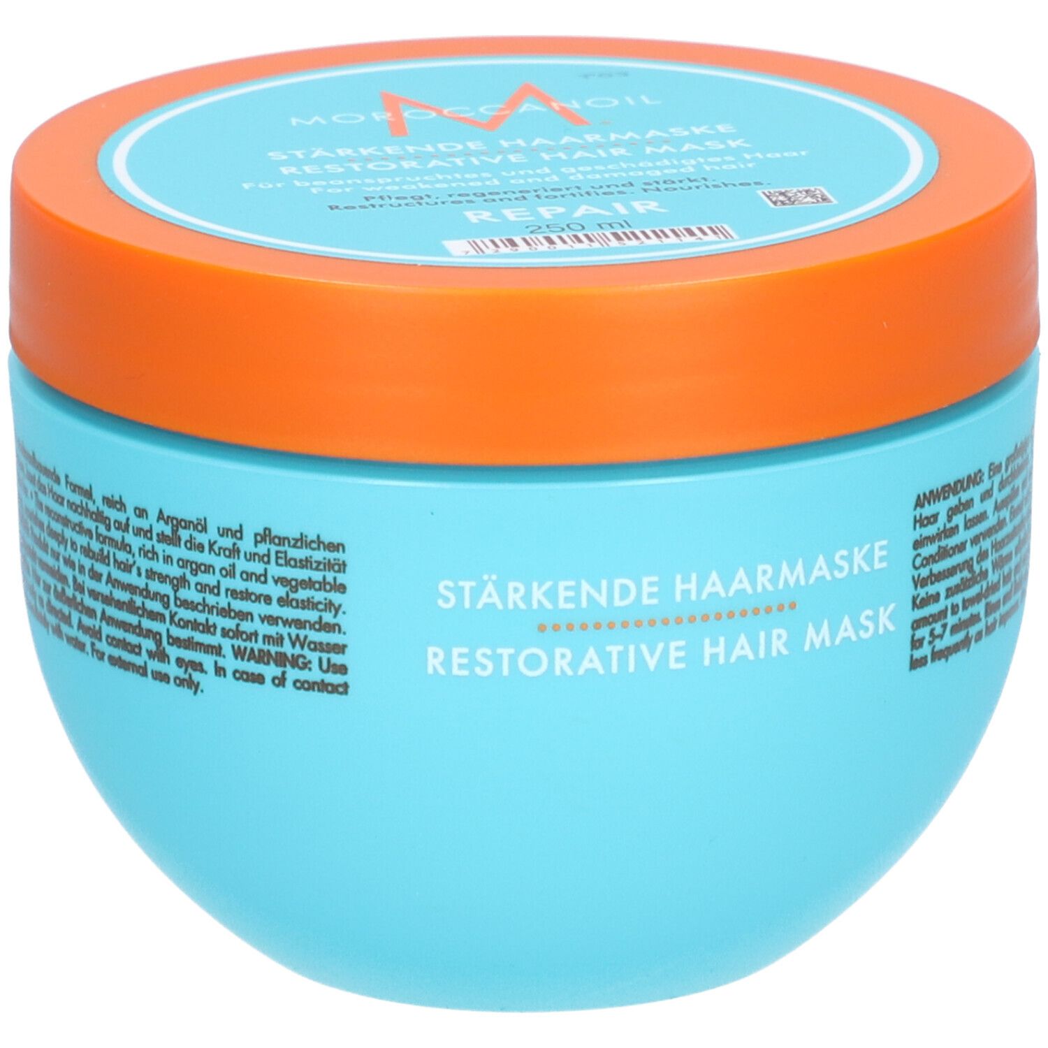 Pot bleu turquoise avec couvercle orange. Inscription : Masque capillaire réparateur. Marque : Moroccanoil.