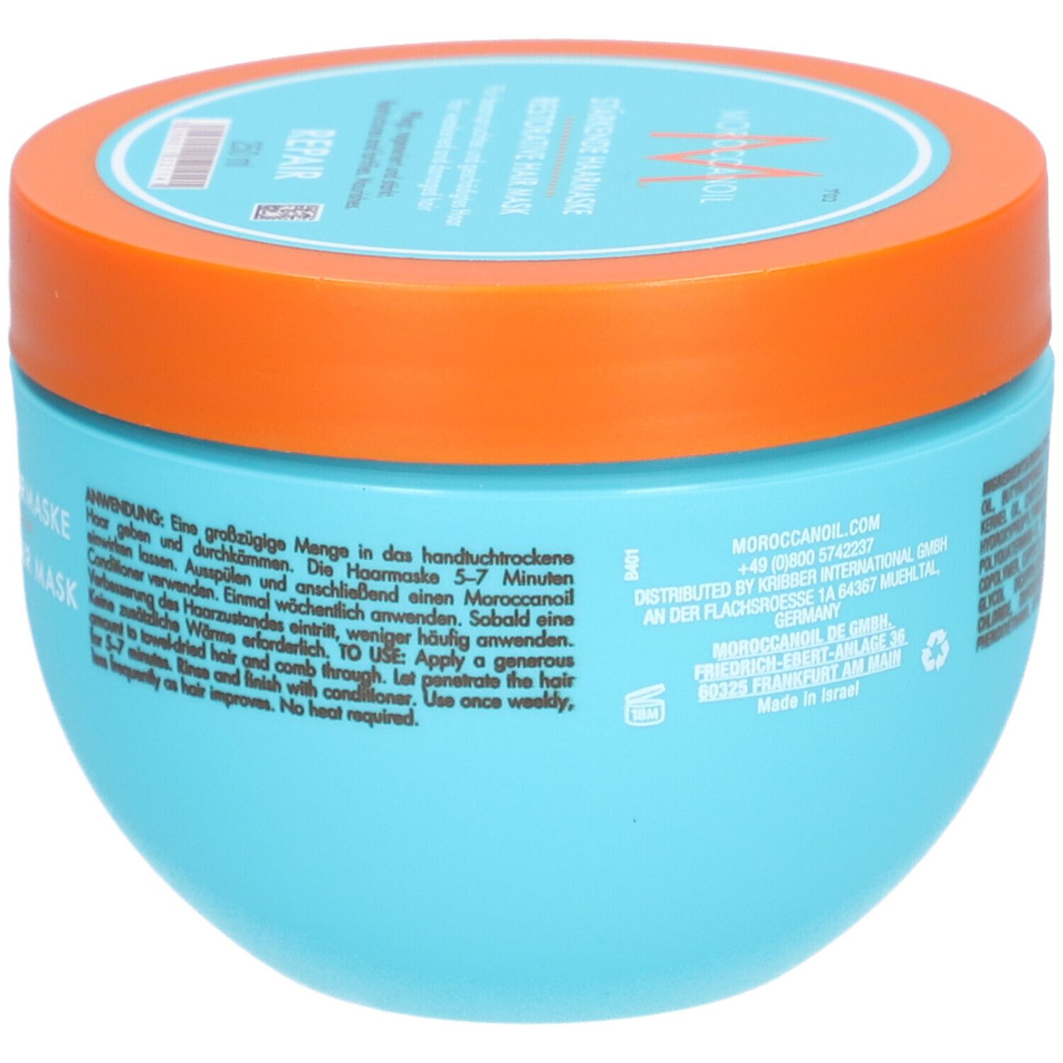 Pot bleu turquoise avec couvercle orange. Inscription : Masque capillaire réparateur. Mode d'emploi.