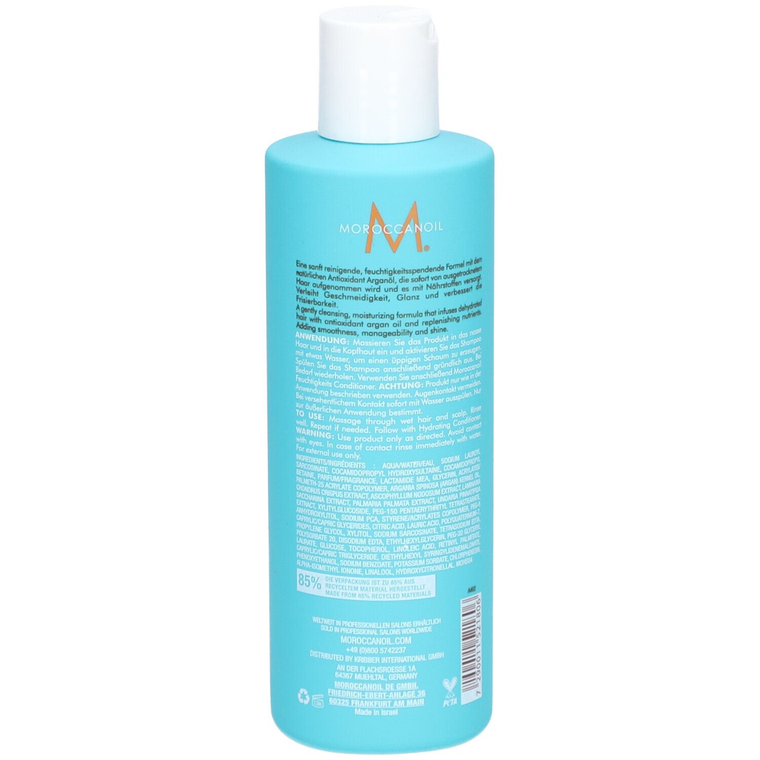 Turquoise fles met witte dop. Achterkant met tekst. Opschrift: Moroccanoil. 8.5 FL.OZ./250 ml.