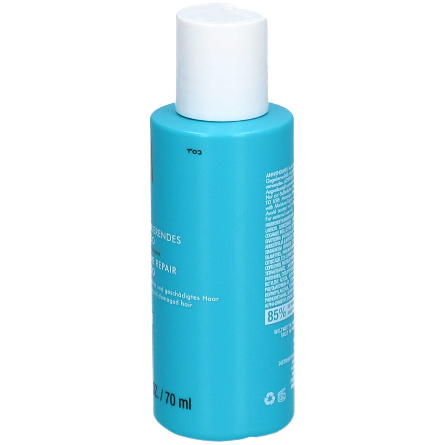 Achterkant van een turquoise shampoo fles met witte dop. Meertalige tekst, 85% gerecycled materiaal, vegan logo.