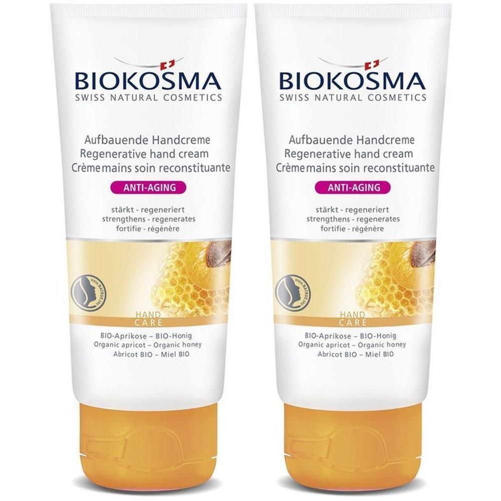 Deux tubes de crème pour les mains. Blanc, avec bouchon jaune. Inscription: BIOKOSMA, Crème mains, Anti-Âge.