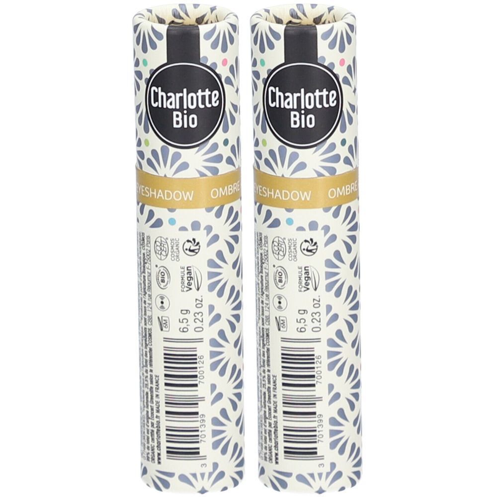 Deux emballages cylindriques avec motif floral. Inscription: Charlotte Bio. Contient de l'ombre à paupières. Vegan. 6,5 g.