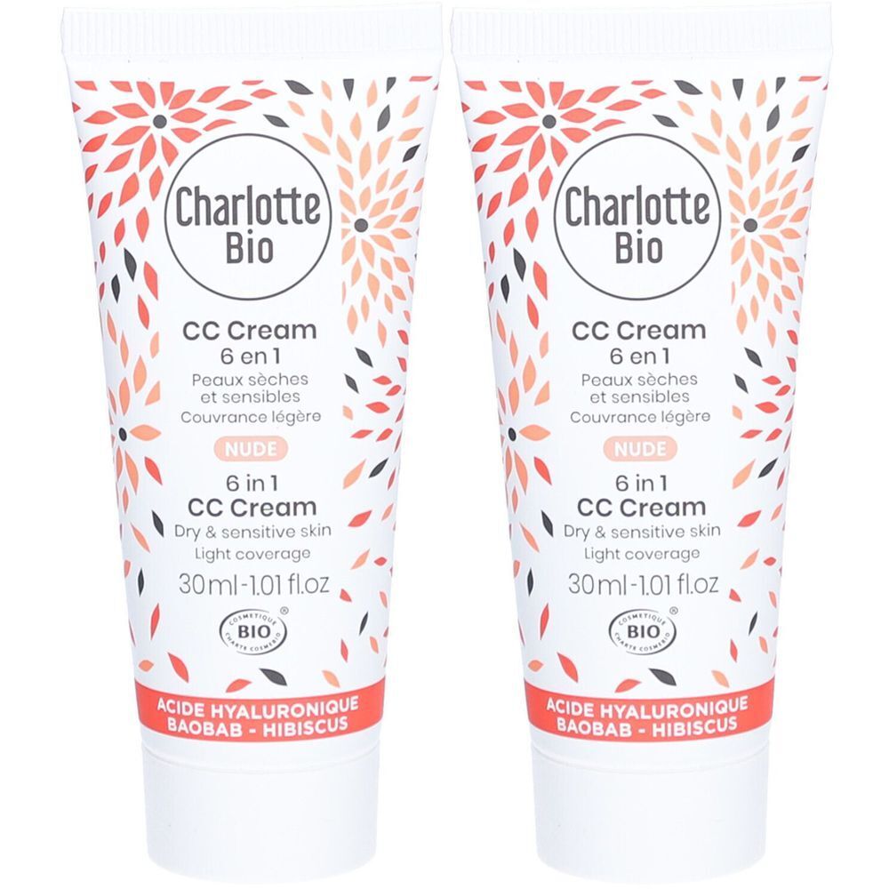 Twee tubes Charlotte Bio CC Cream. Witte tubes met bloemmotief en productinformatie. Opschrift: Nude, 6 in 1 CC Cream.