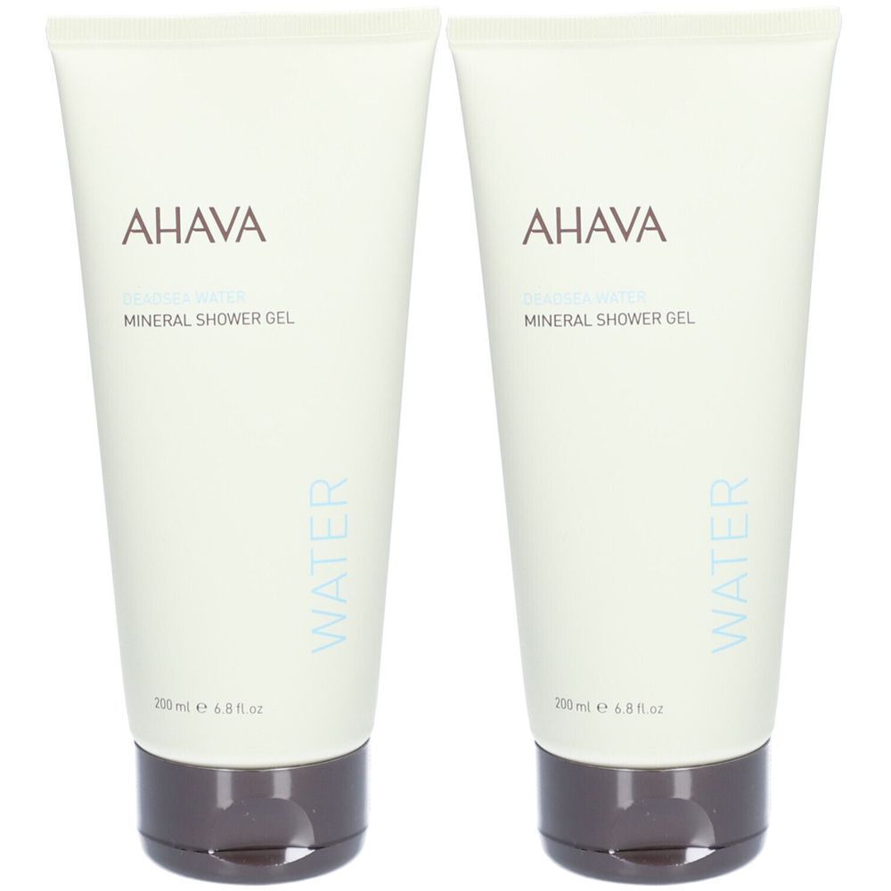 Twee tubes AHAVA Mineral Shower Gel. Wit-beige tubes met bruine doppen. AHAVA-logo en productnaam.