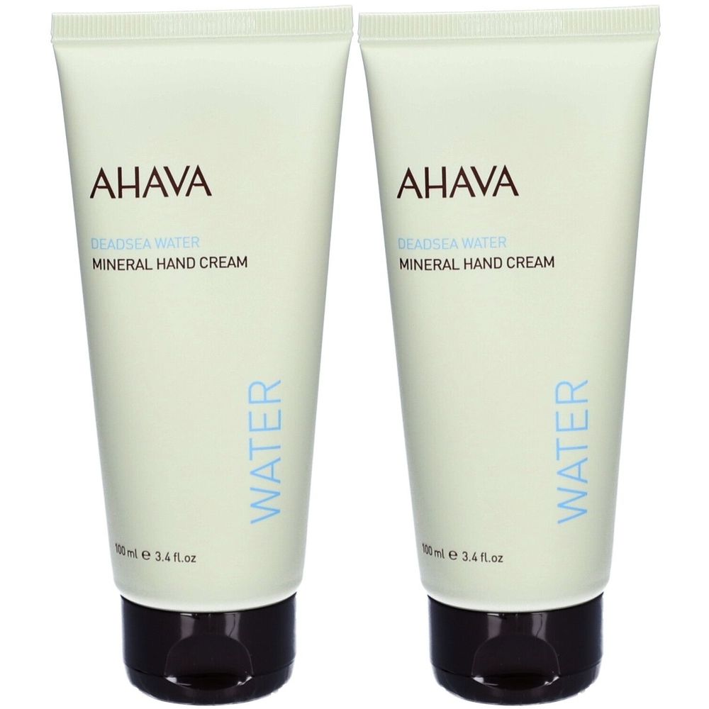 Twee tubes AHAVA handcrème. Lichtgroene tubes met bruine dop. Opschrift: AHAVA, Deadsea Water, Mineral Hand Cream.