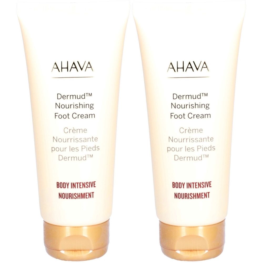 Twee tubes voetcrème. Wit, met gouden dop. Opschrift: AHAVA, Dermud, Nourishing Foot Cream.