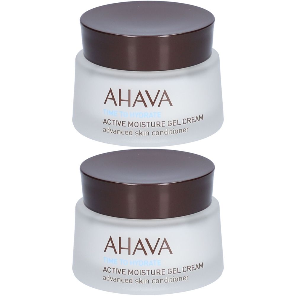 Twee potten AHAVA Active Moisture Gel Cream. Bruine deksels, wit glas. Opschrift op het glas.