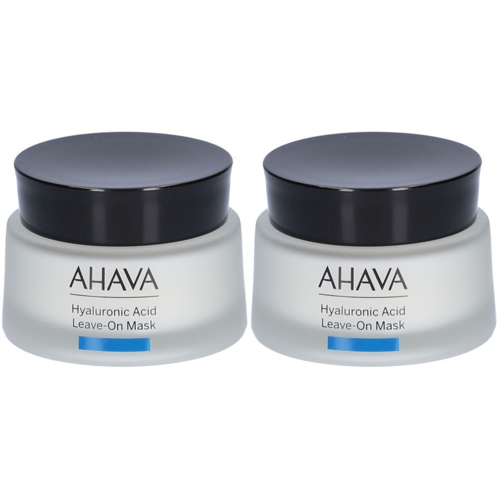 Twee potten AHAVA Hyaluronic Acid Leave-On Mask. Witte potten met zwarte deksels. Blauwe accentlijn.