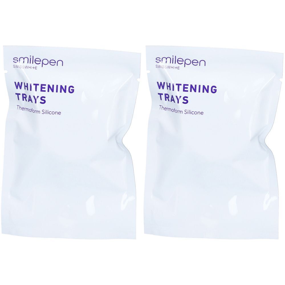 Deux sachets blancs avec l'inscription "smilepen Whitening Trays". Matériau : Thermofom Silicone.