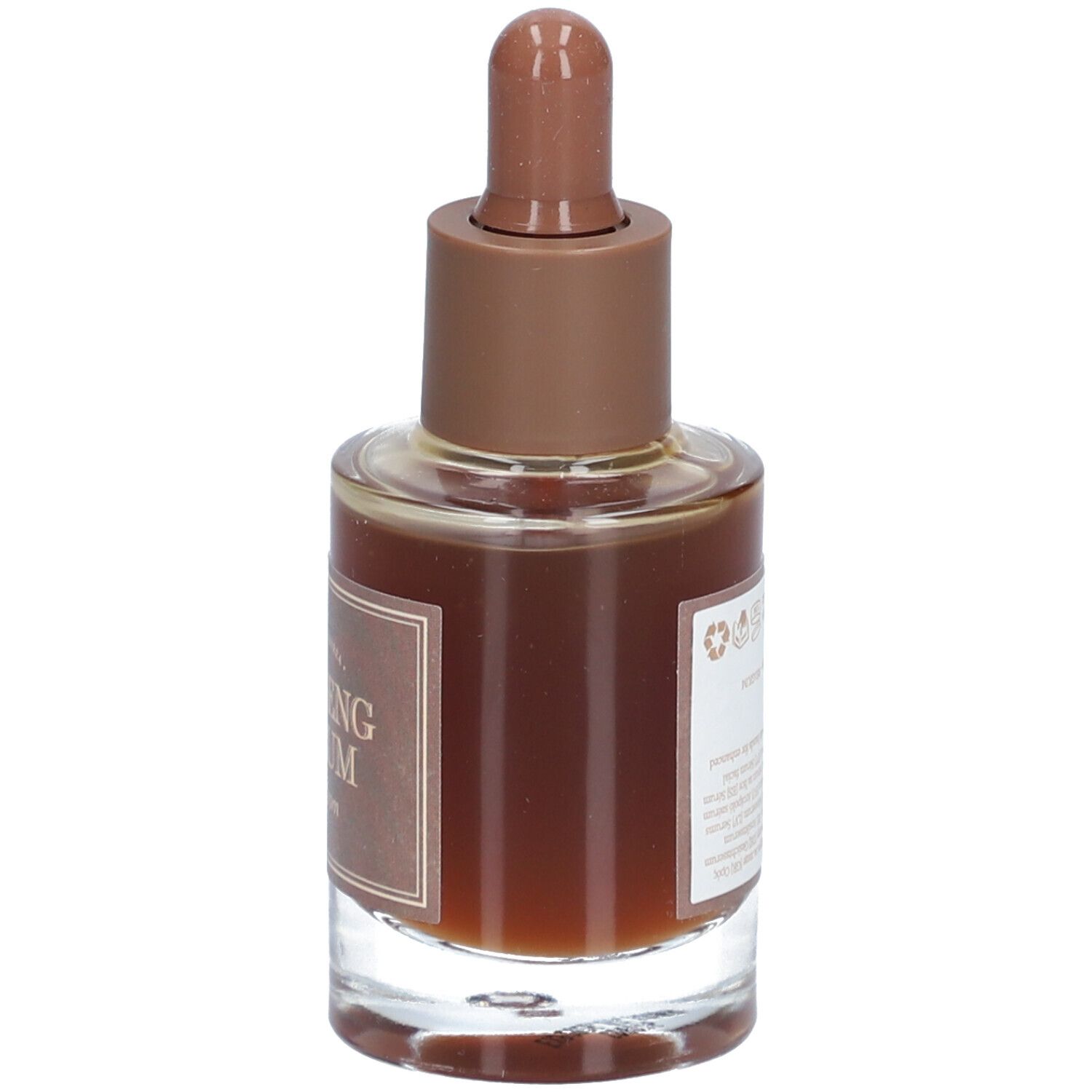 Glazen fles met bruine vloeistof en bruine dop. Op het etiket staat "Ginseng Serum" en "I'm from".