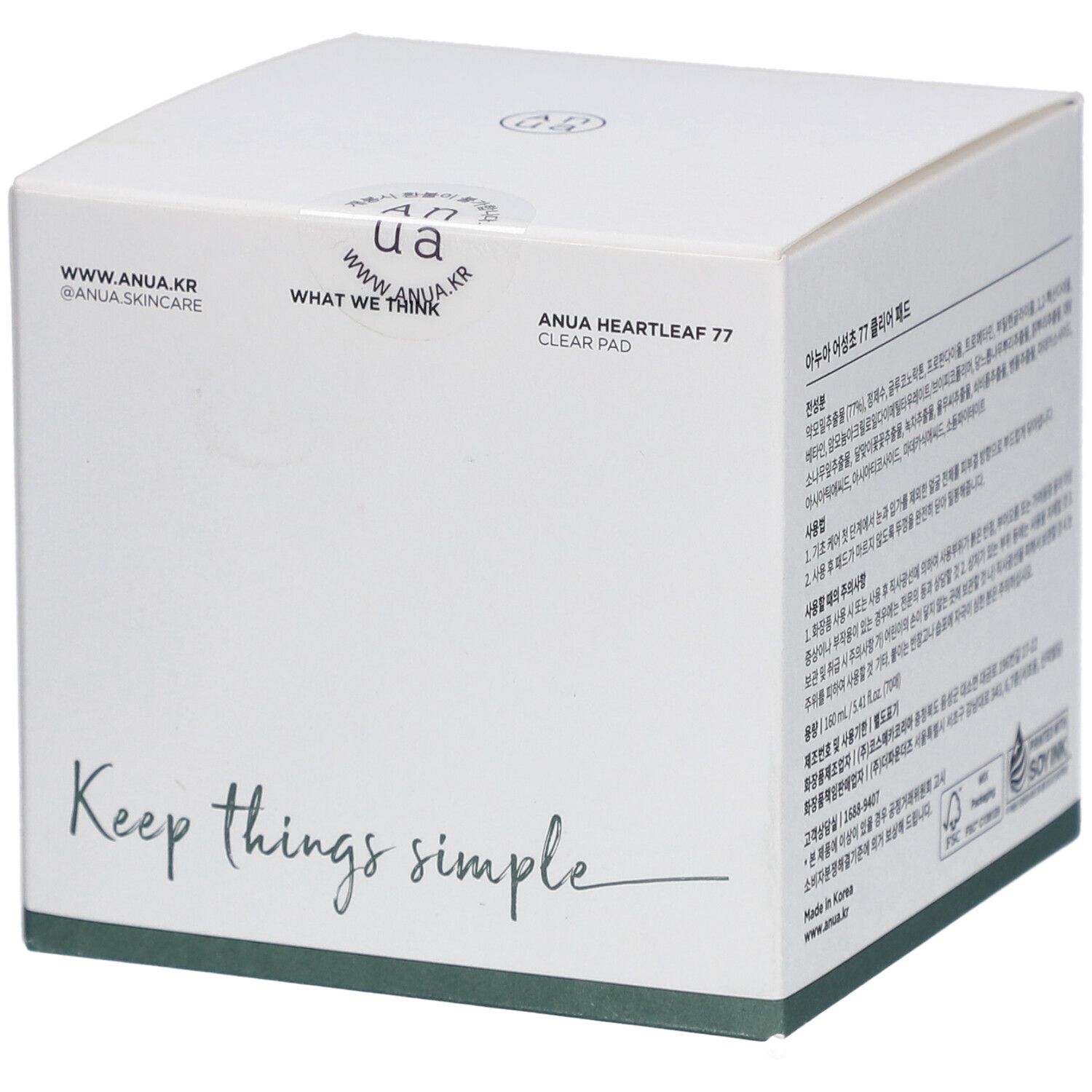 Witte doos met productinformatie. Opschrift: Anua, Heartleaf 77 Clear Pad. Tekst: Keep things simple.