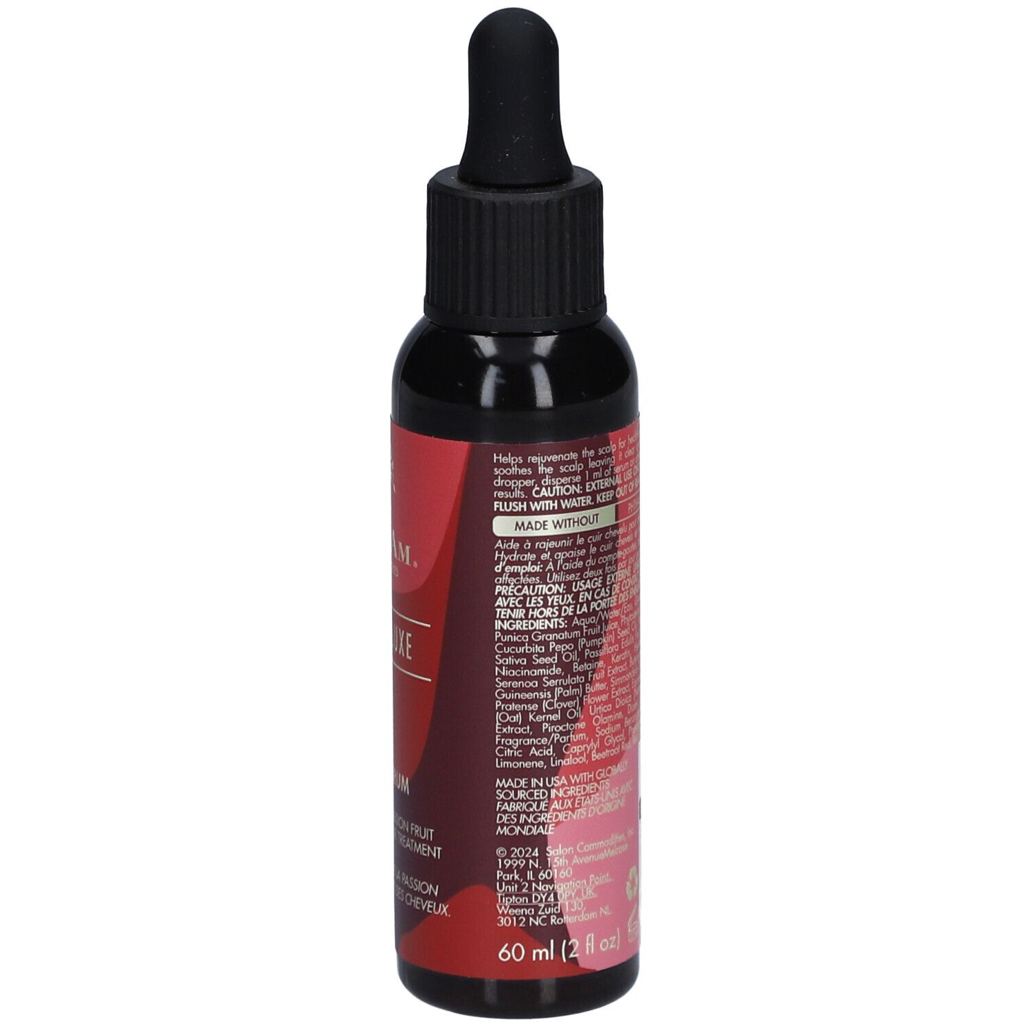 Donkere fles, zijaanzicht. Rode sticker met tekst en ingrediënten. Zwarte dop met pipet.