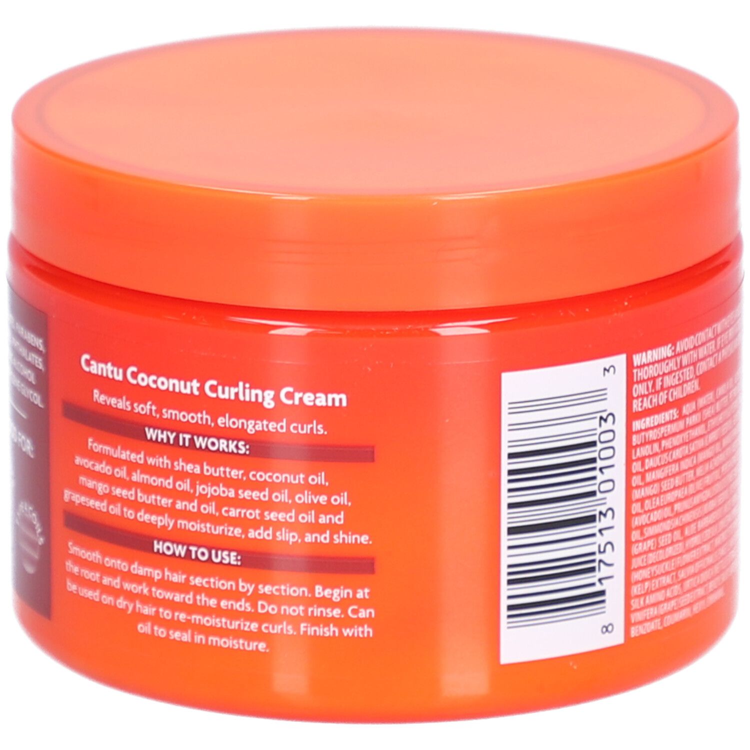 Dos du pot avec instructions d'utilisation. Couvercle orange. Contient du beurre de karité, de l'huile de coco.