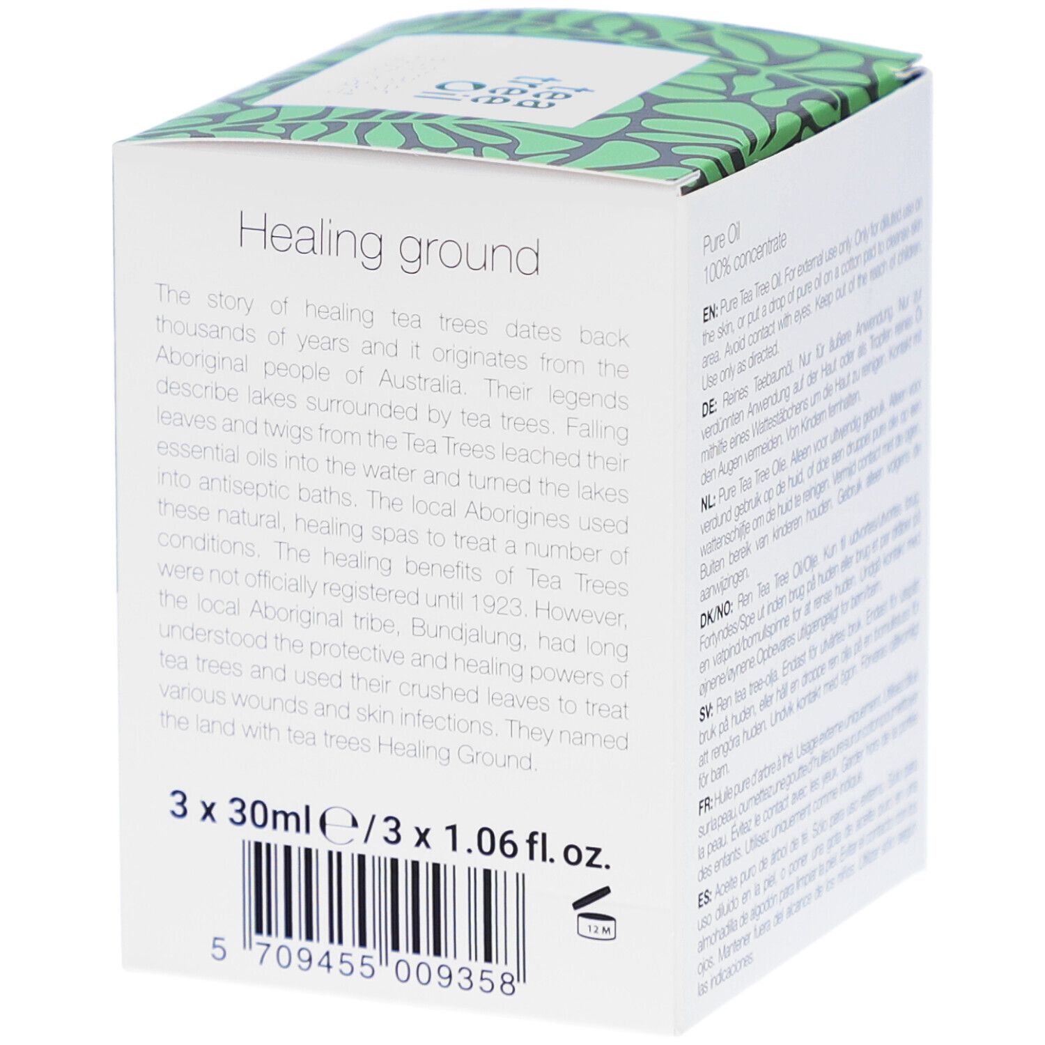 Dos de la boîte avec texte sur l'histoire de l'huile de théier et code-barres.