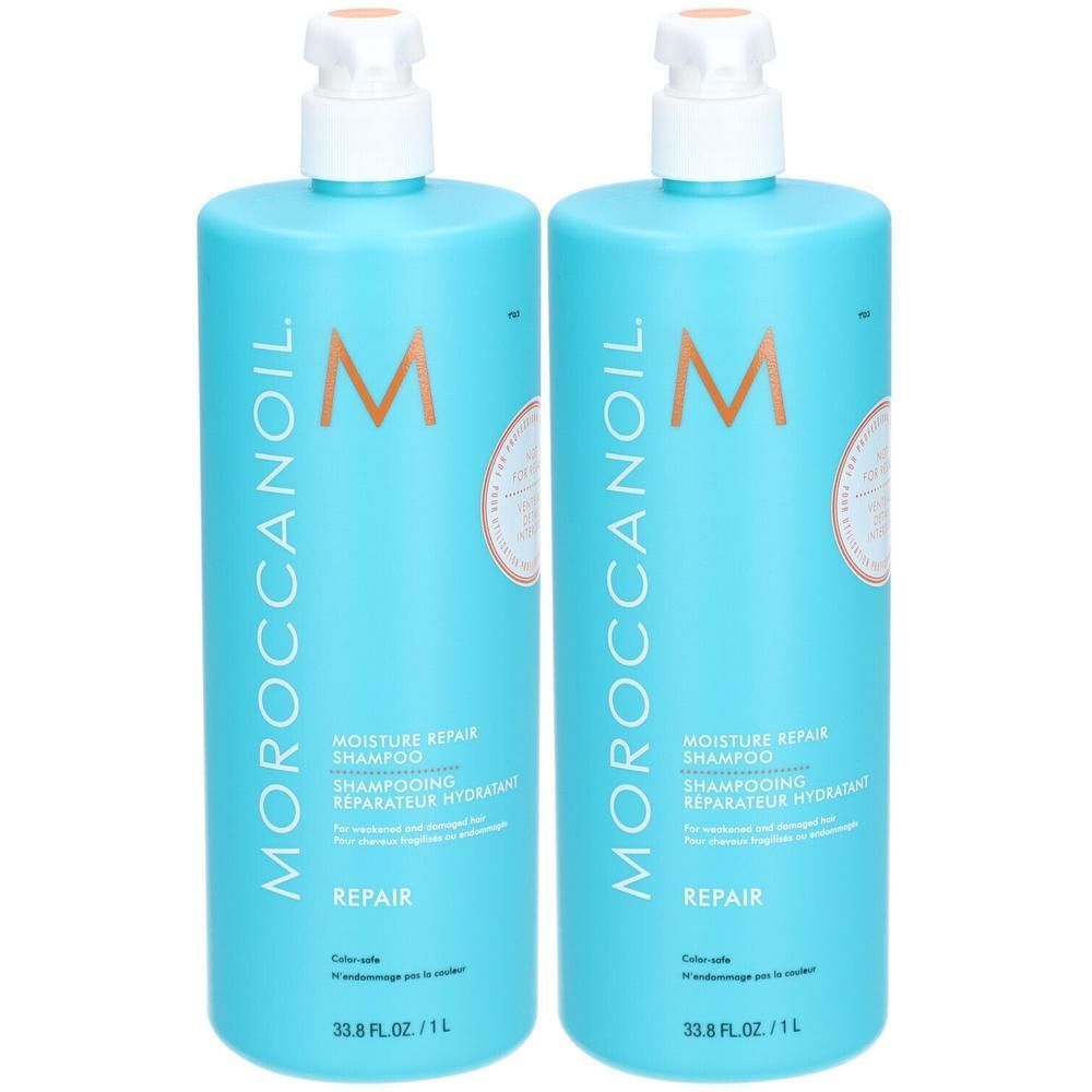 Twee turquoise flessen Moroccanoil Moisture Repair Shampoo met pompdispenser. Elke fles bevat 1L.