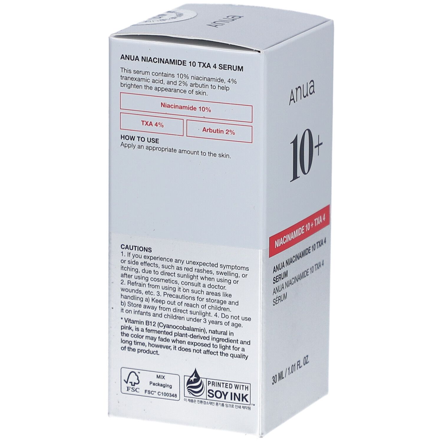 Emballage avec informations sur le produit. Contient de la niacinamide, de l'acide tranexamique et de l'arbutine. Avertissements et utilisation.