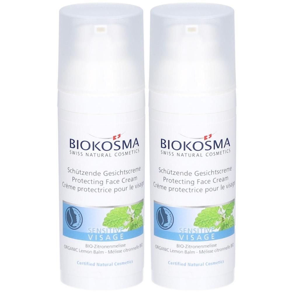 Deux tubes de crème protectrice pour le visage BIOKOSMA Sensitive. Flacons blancs avec graphiques bleus et verts. Texte: Sensitive Visage.