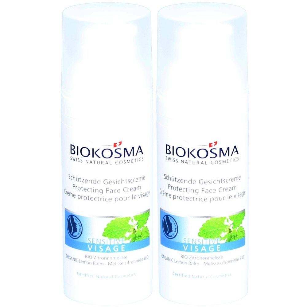 Twee BIOKOSMA Sensitive Face Protecting Face Cream tubes. Witte flessen met blauwe en groene afbeeldingen. Tekst: Sensitive Visage, Protecting Face Cream.